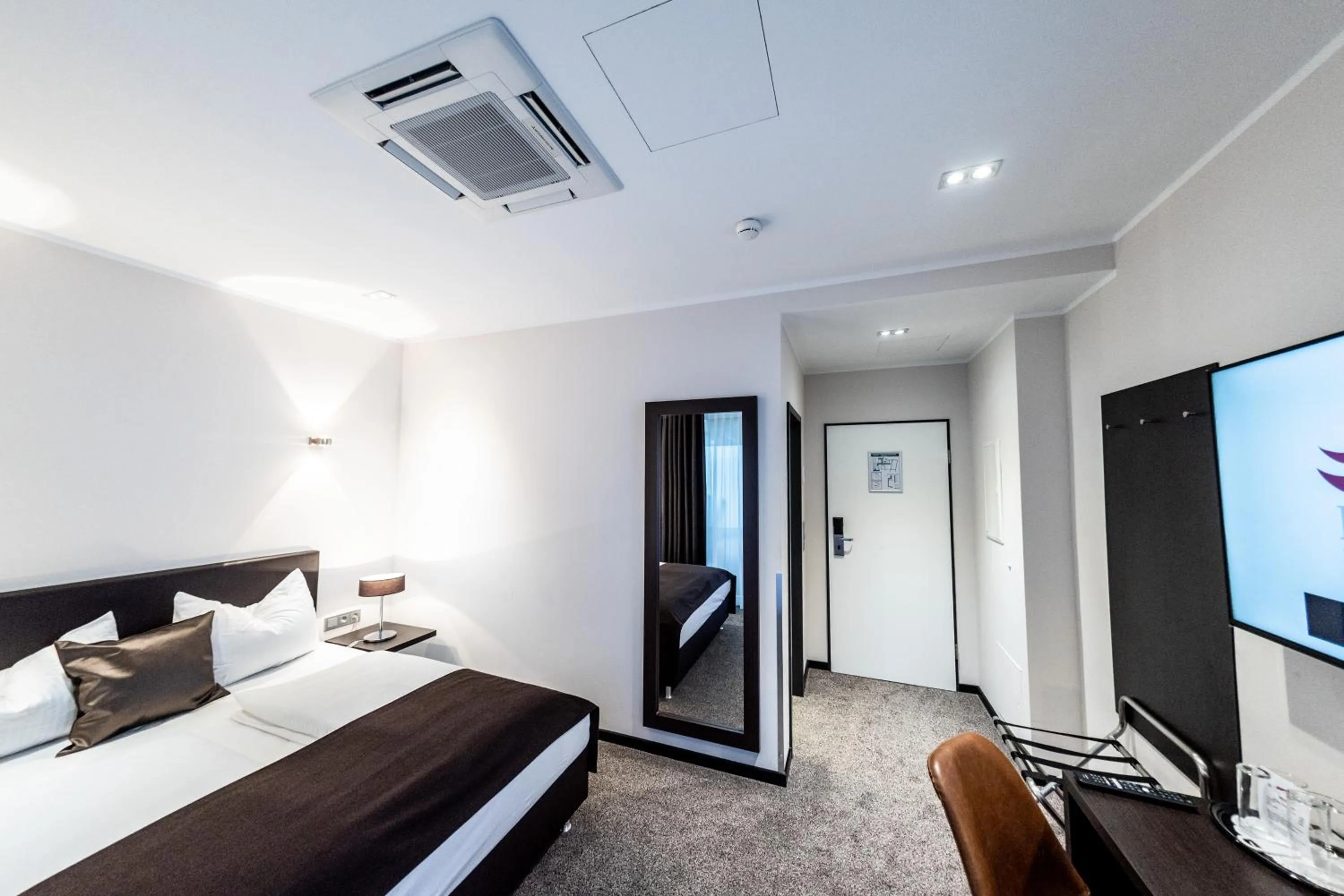 Photo of the whole room, Bed in Mauritius Hotel & Therme