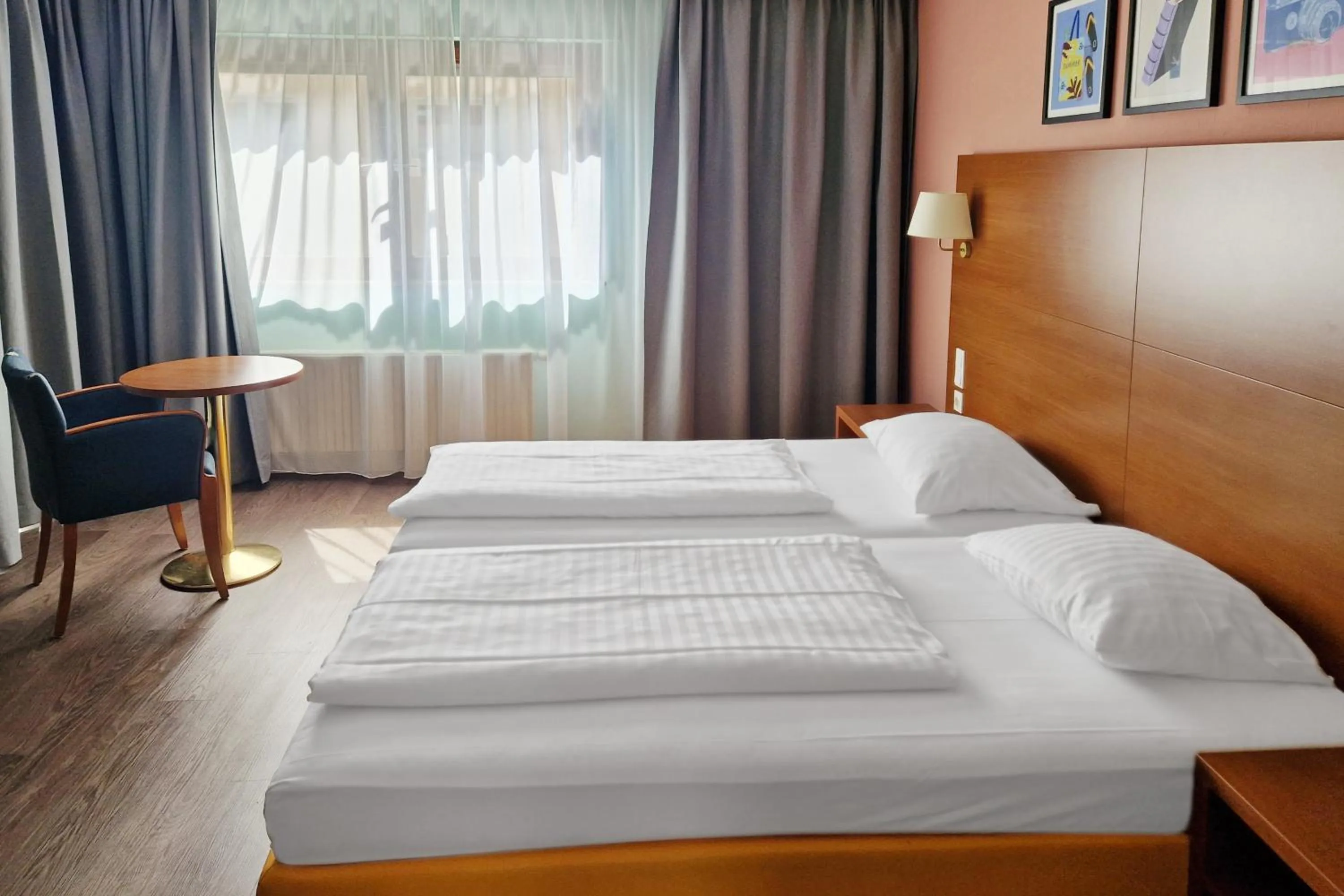Bed in Hotel Rega Stuttgart