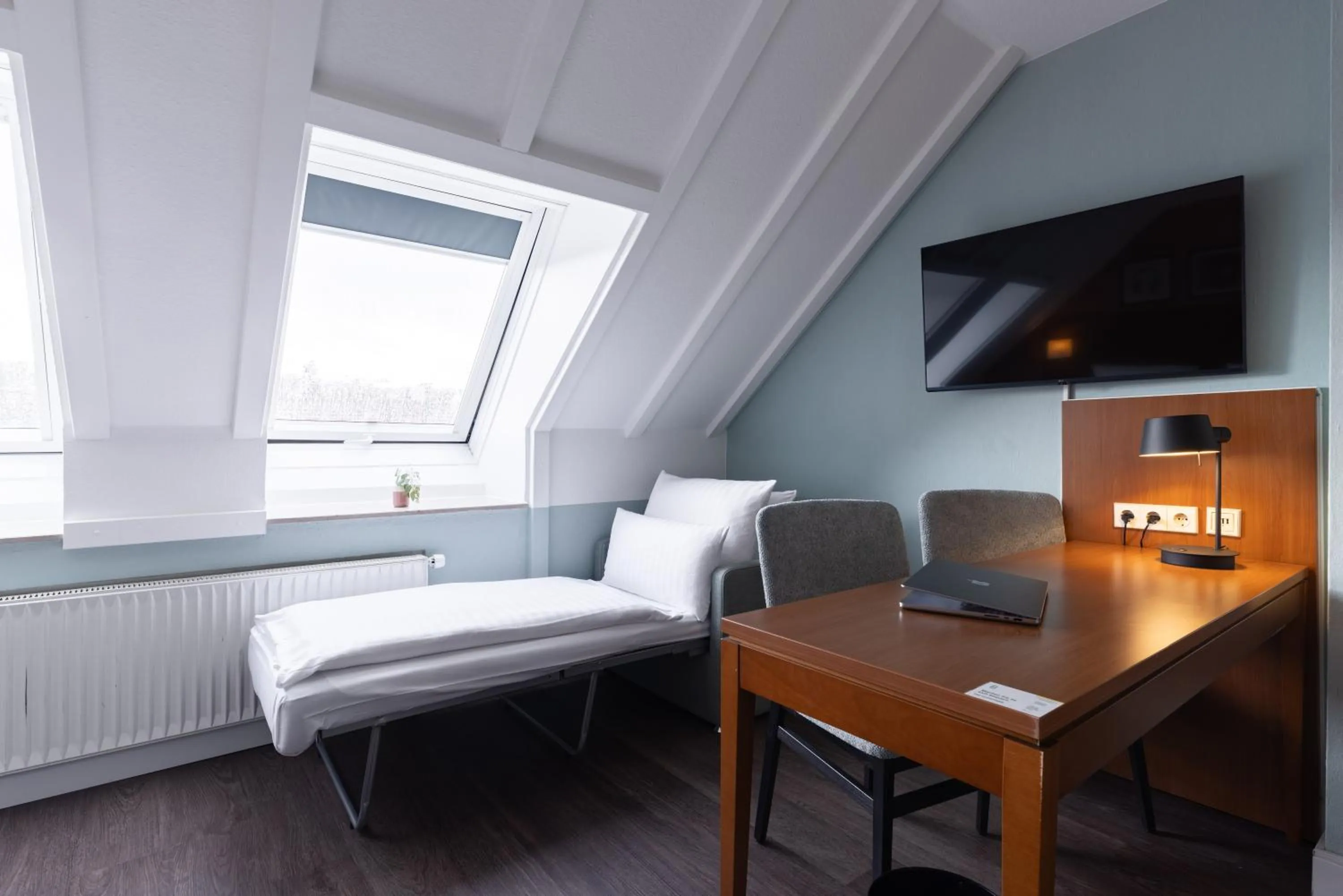 Bed in Garner Hotel Stuttgart City Centre by IHG