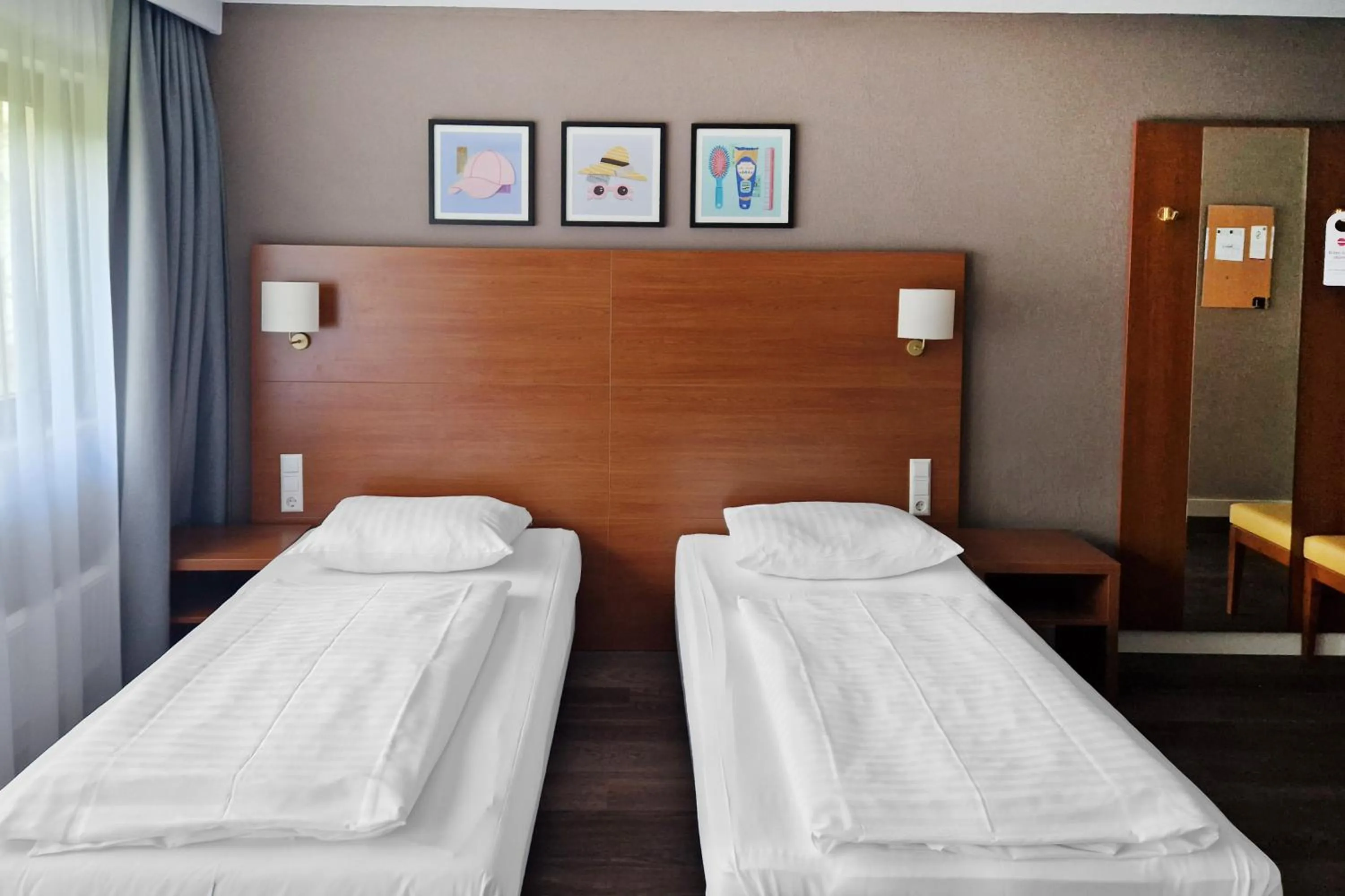 Photo of the whole room, Bed in Hotel Rega Stuttgart