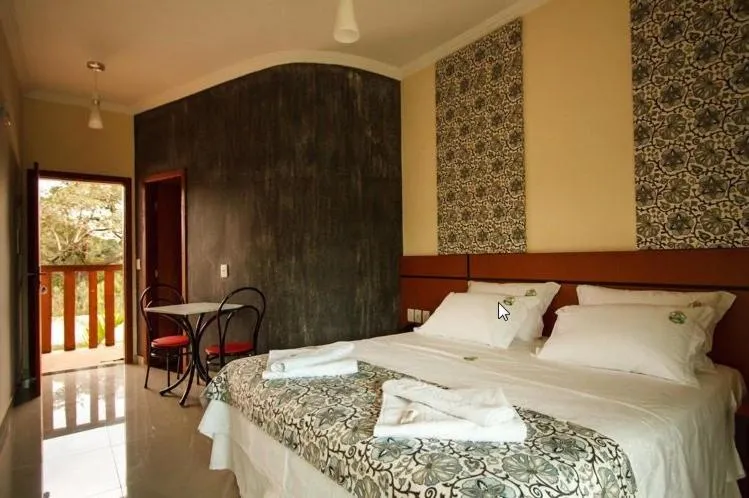 Photo of the whole room, Bed in Estrada Real Palace Hotel