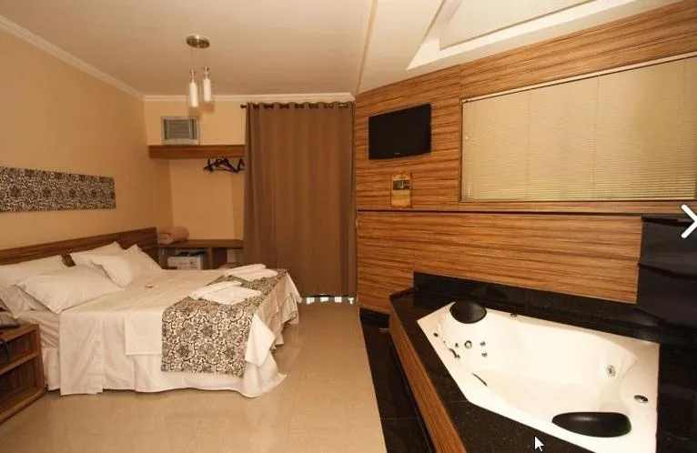 Photo of the whole room, Bed in Estrada Real Palace Hotel