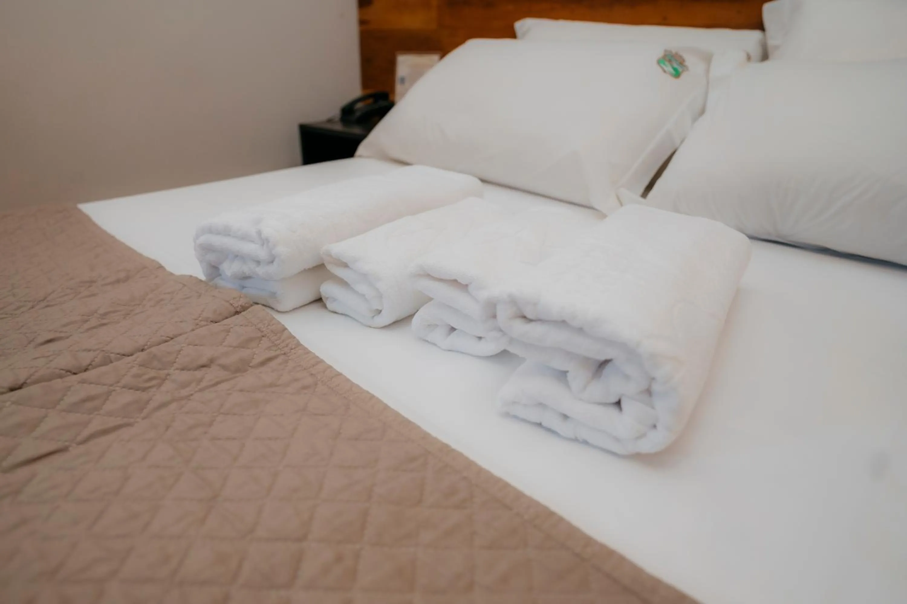 Bed in Estrada Real Palace Hotel