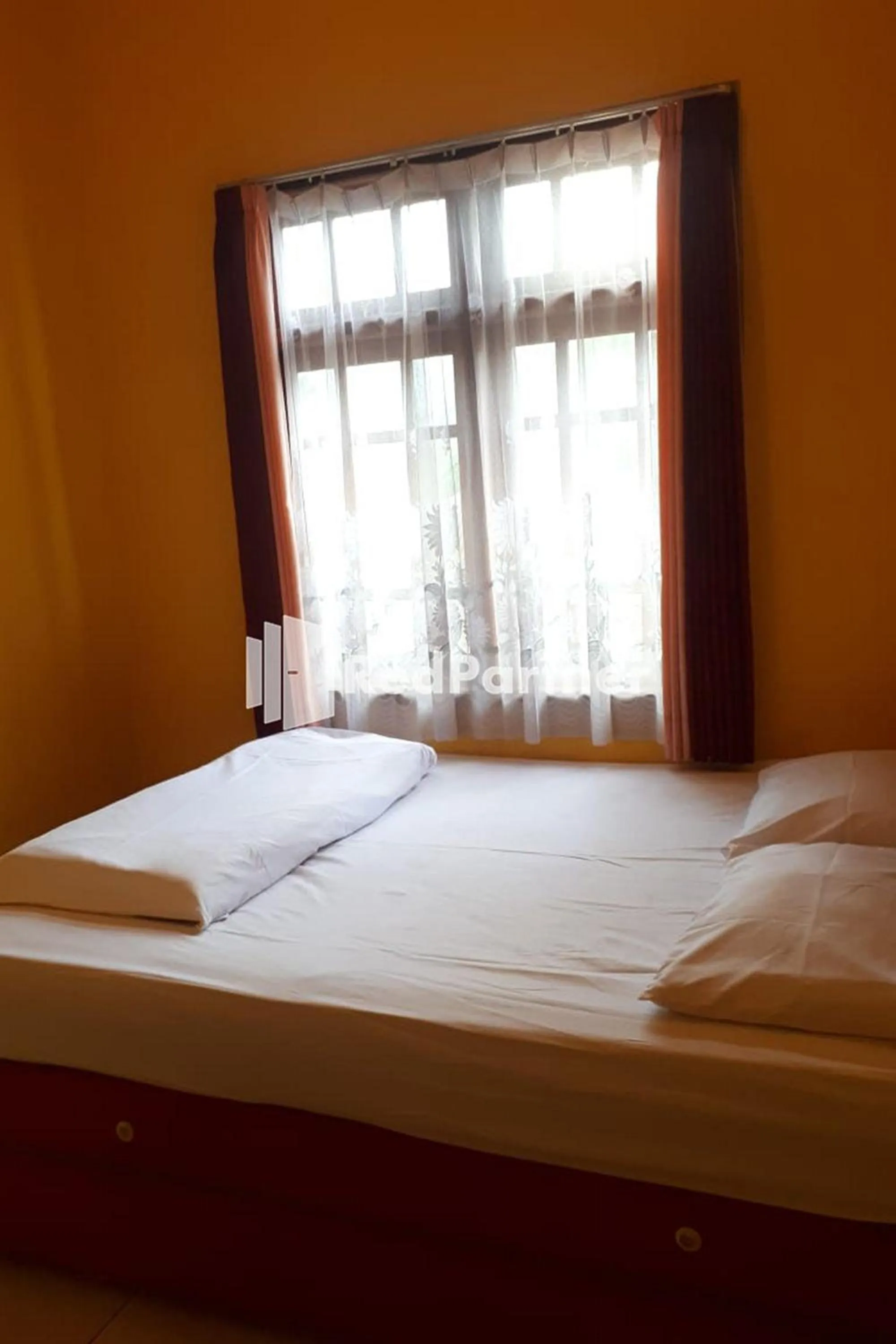 Bed in Bromo Indah Lestari Homestay Mitra RedDoorz