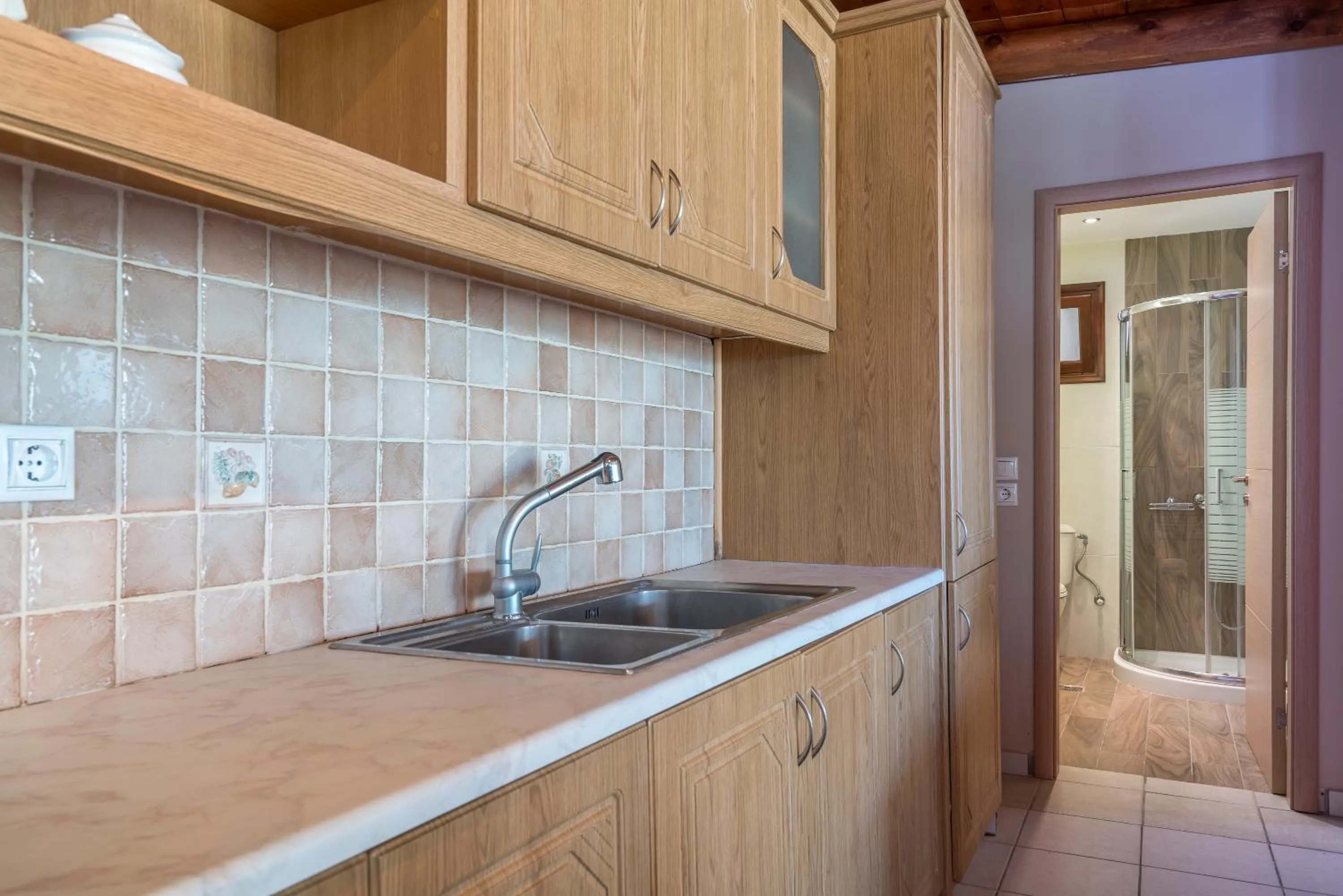 Kitchen or kitchenette in Fiore Beach Studios