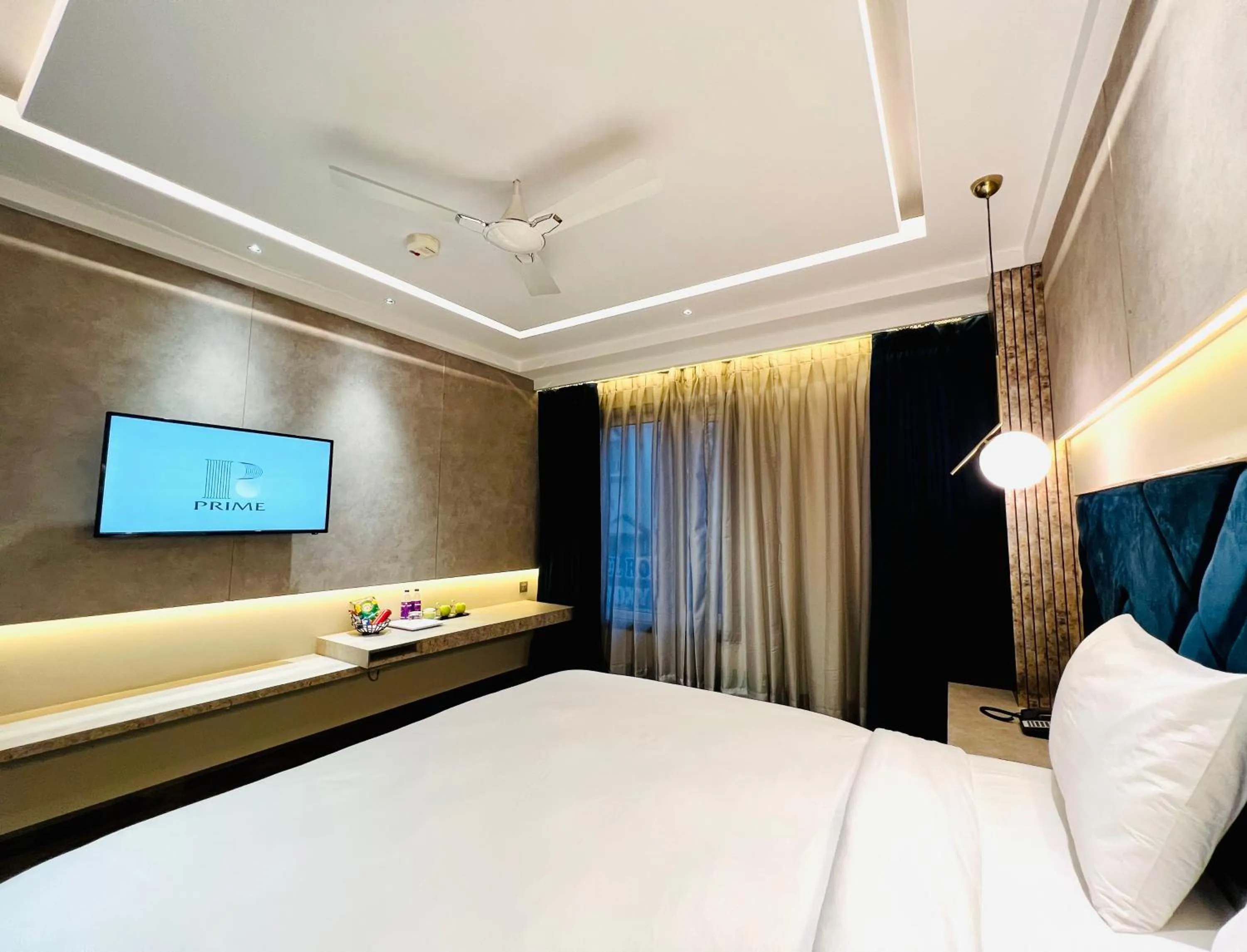 Bed in The Prime Delhi Luxe Collection Hotel