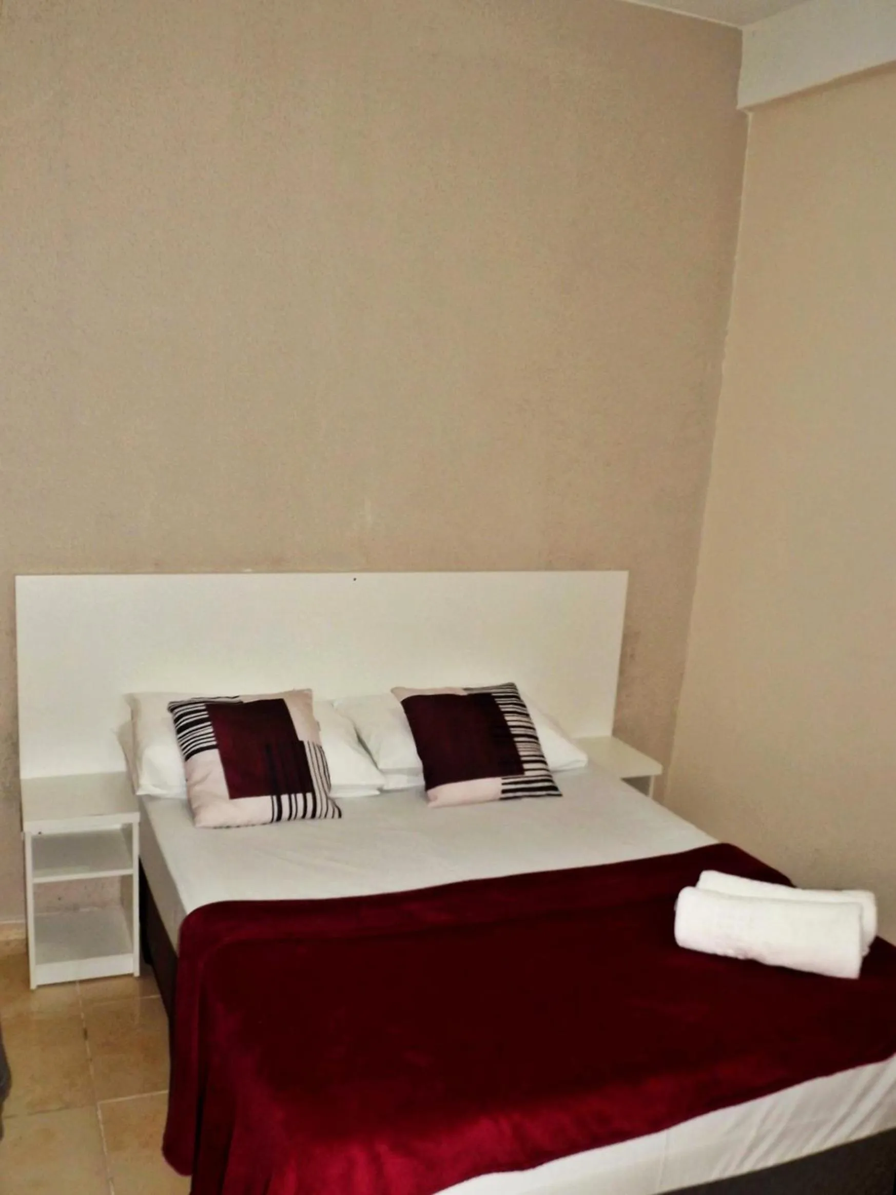 Bed in Pousada do Pescador