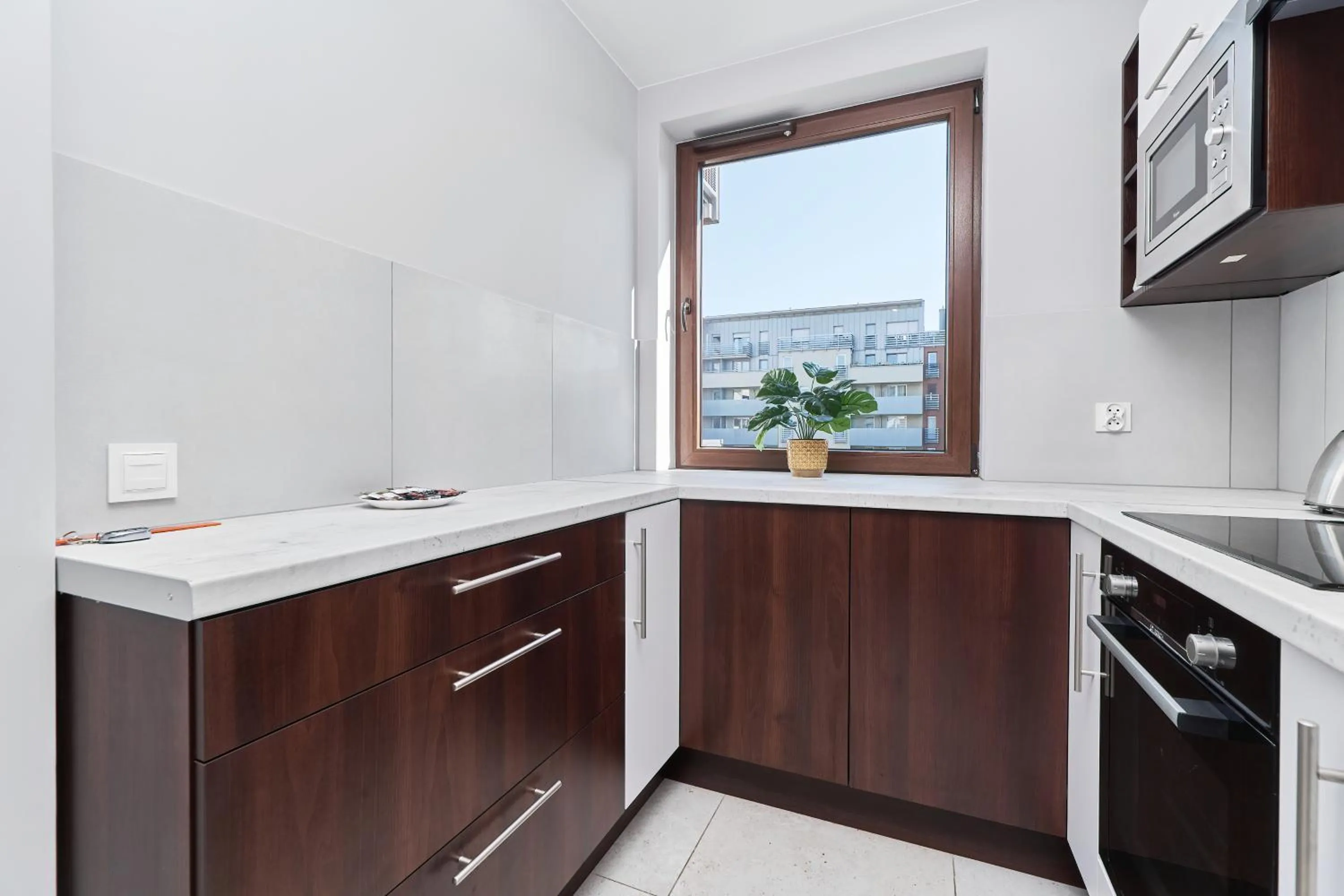 Kitchen or kitchenette in Nowa Tęczowa Apartments Promenada Staromiejska by Noclegi Renters