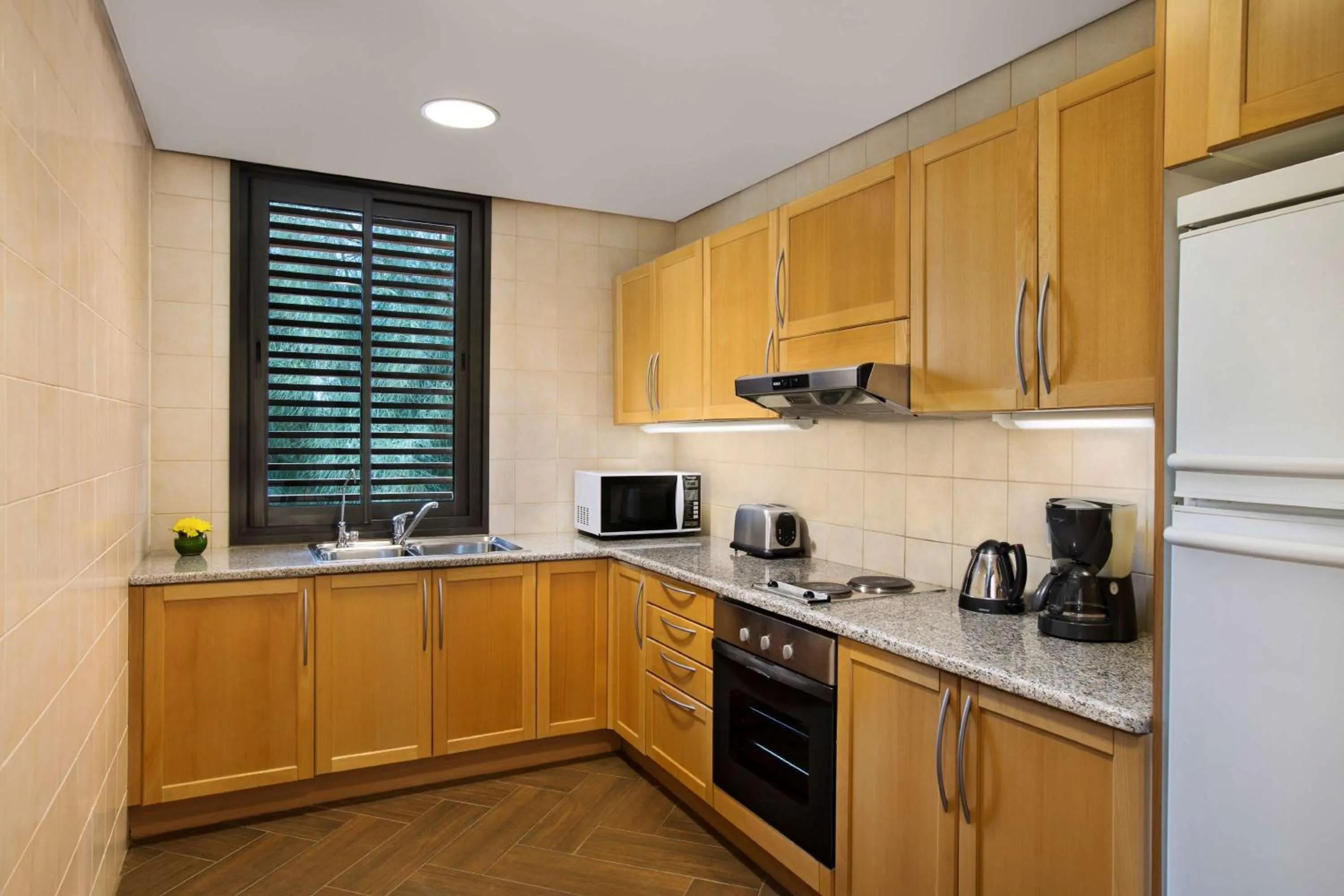 Kitchen or kitchenette, Kitchen/Kitchenette in Hilton Kuwait Resort