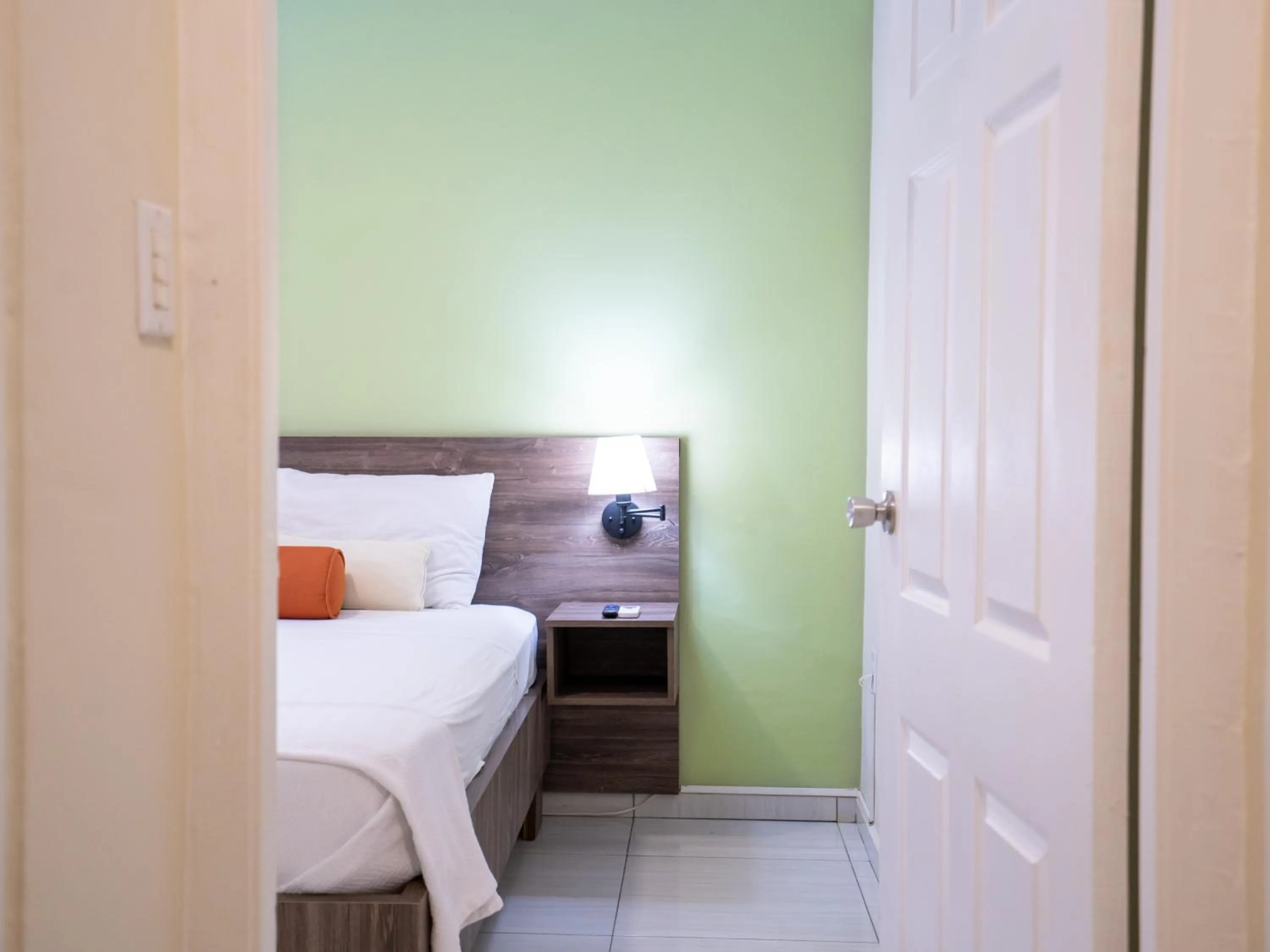 Bedroom in Delynne Boutique Hotel