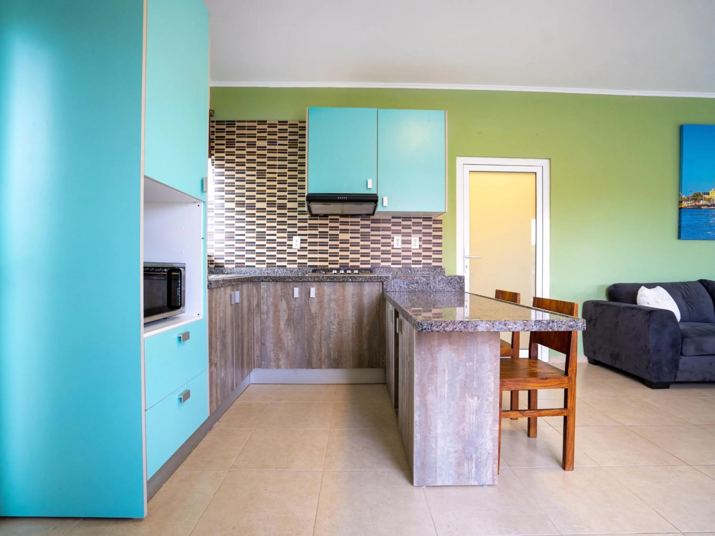 Kitchen or kitchenette in Delynne Boutique Hotel