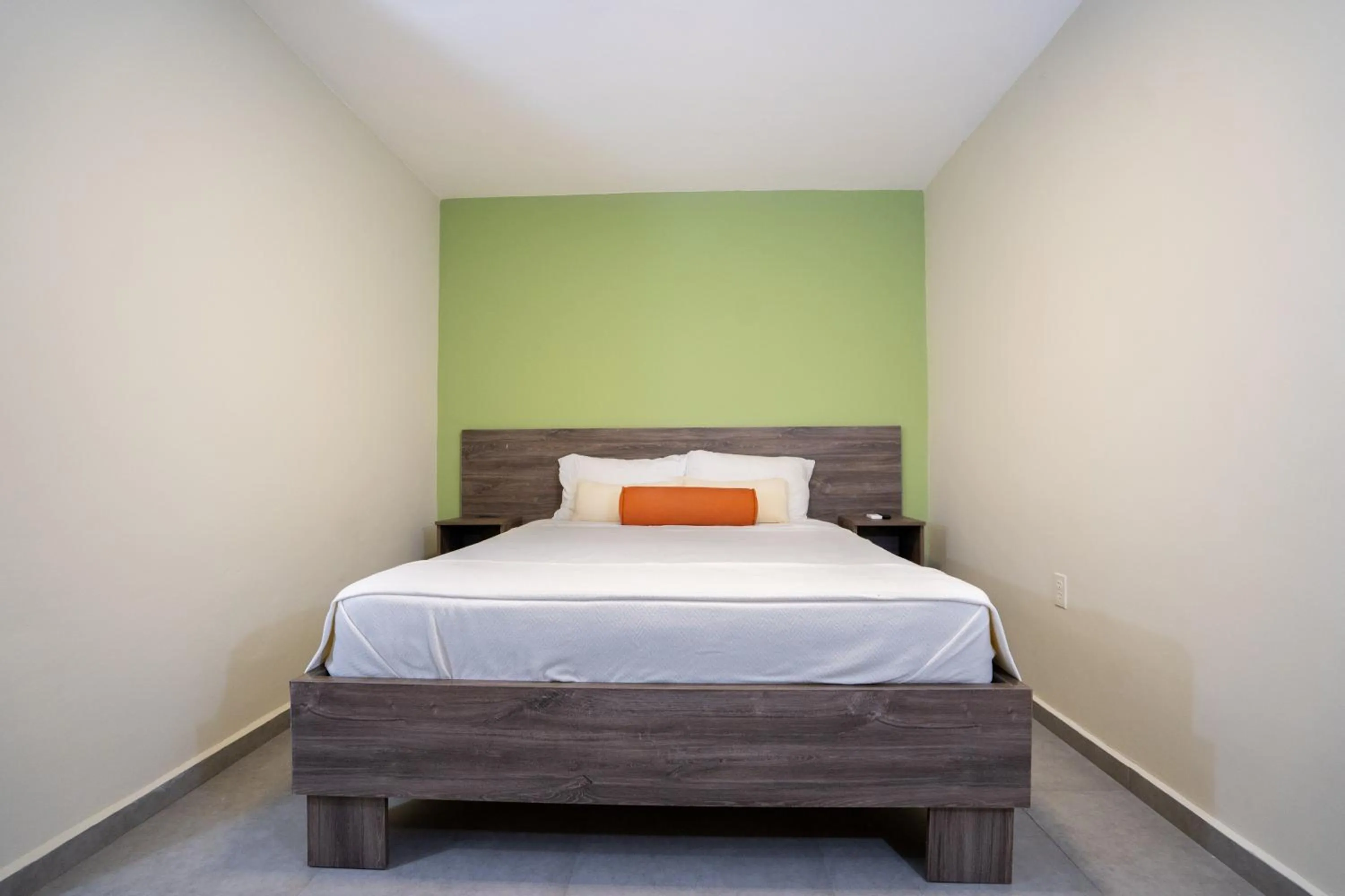 Bedroom in Delynne Boutique Hotel