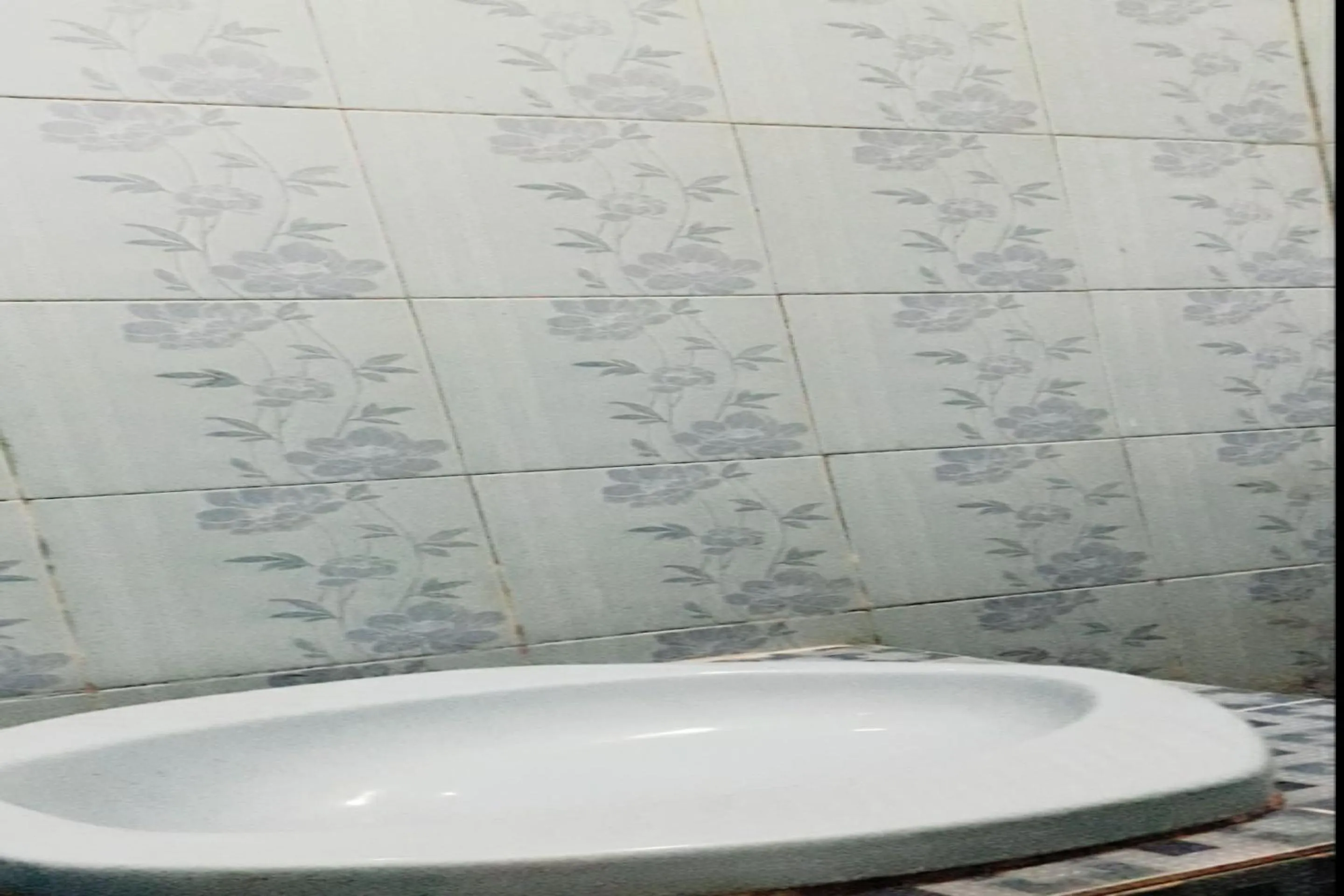 Bathroom in OYO 90706 Kost Alam Jaya Syariah