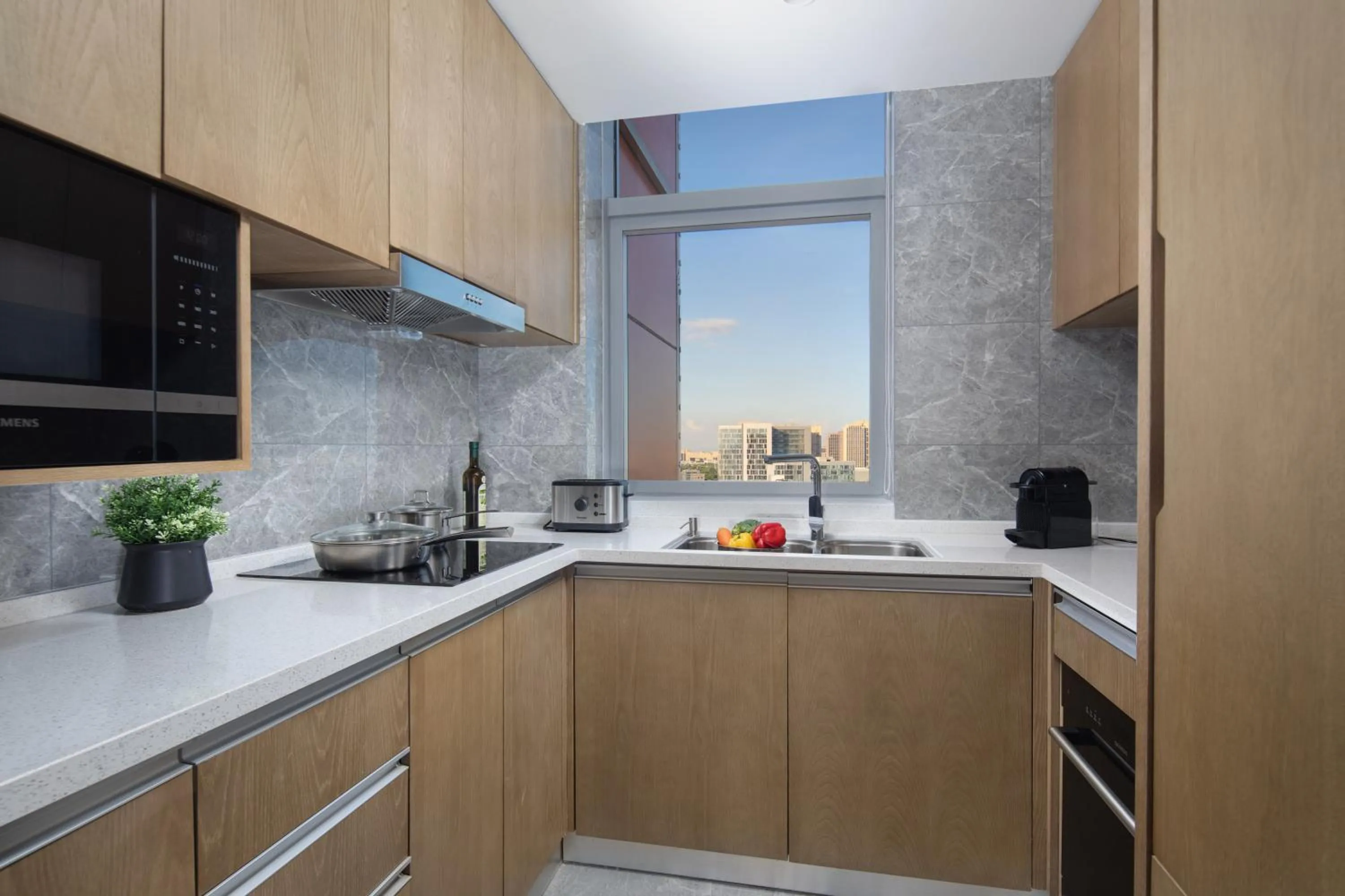 kitchen in Ascott New District Wuxi