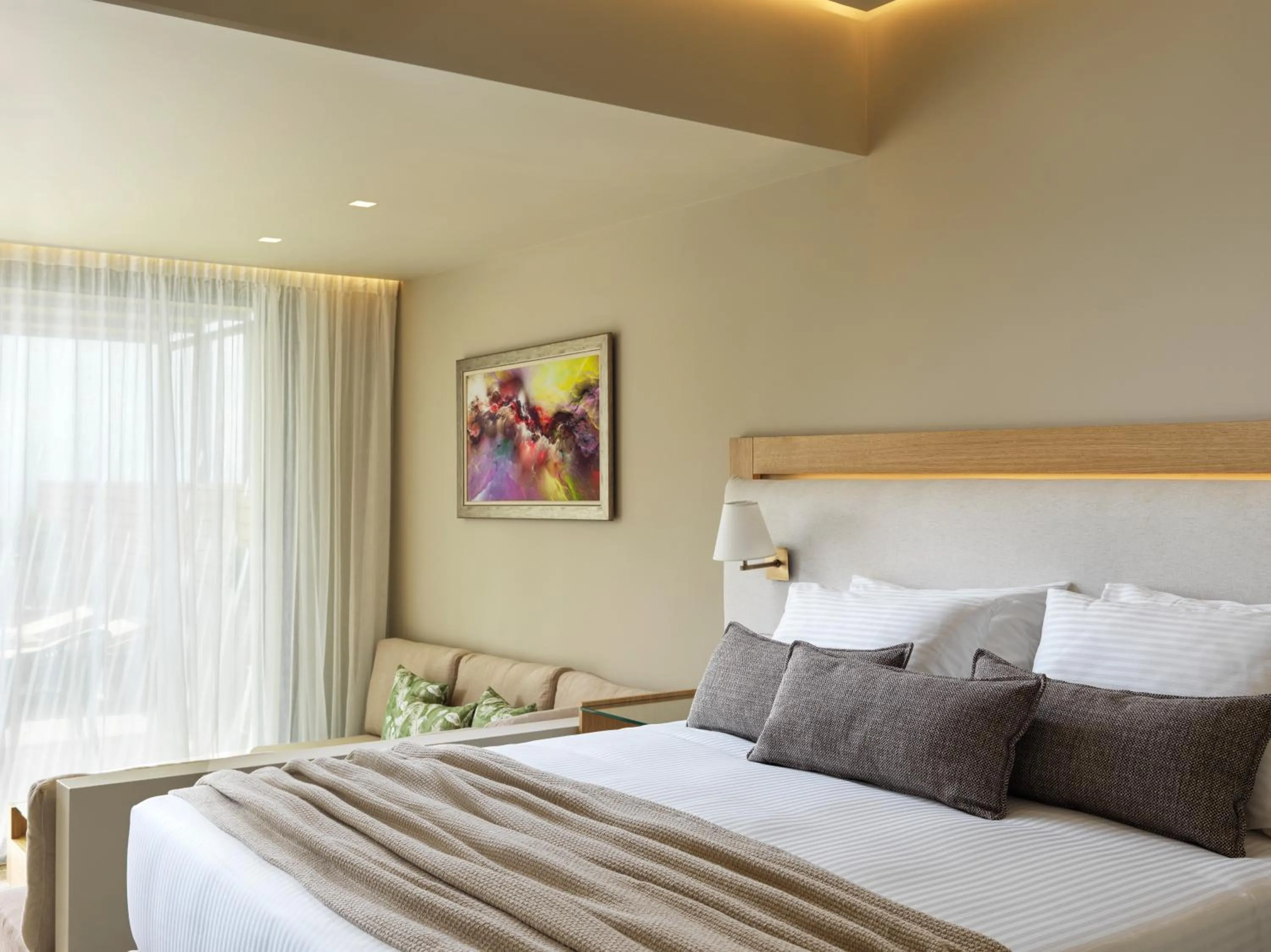 Bed in Celestial All Suites