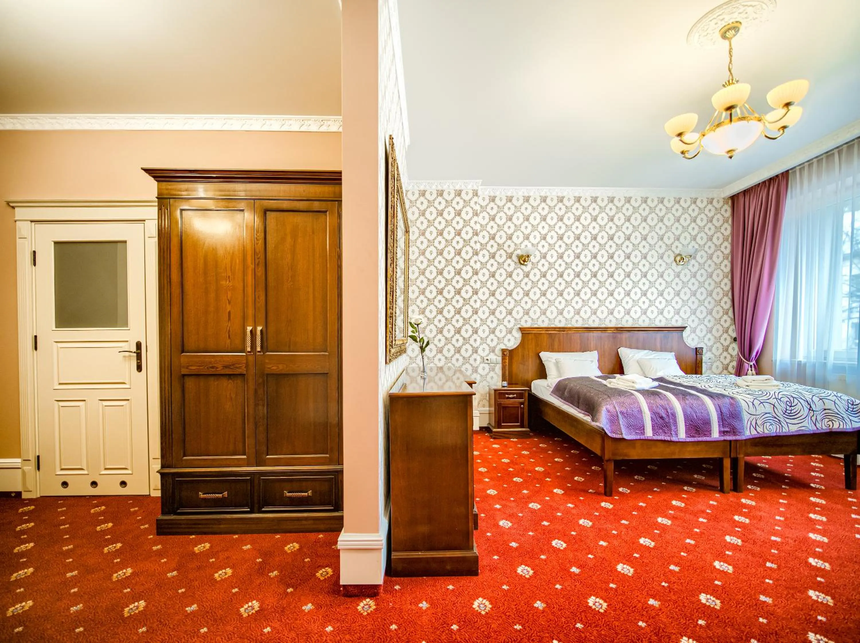 Bed in ApartHotel Hubertus