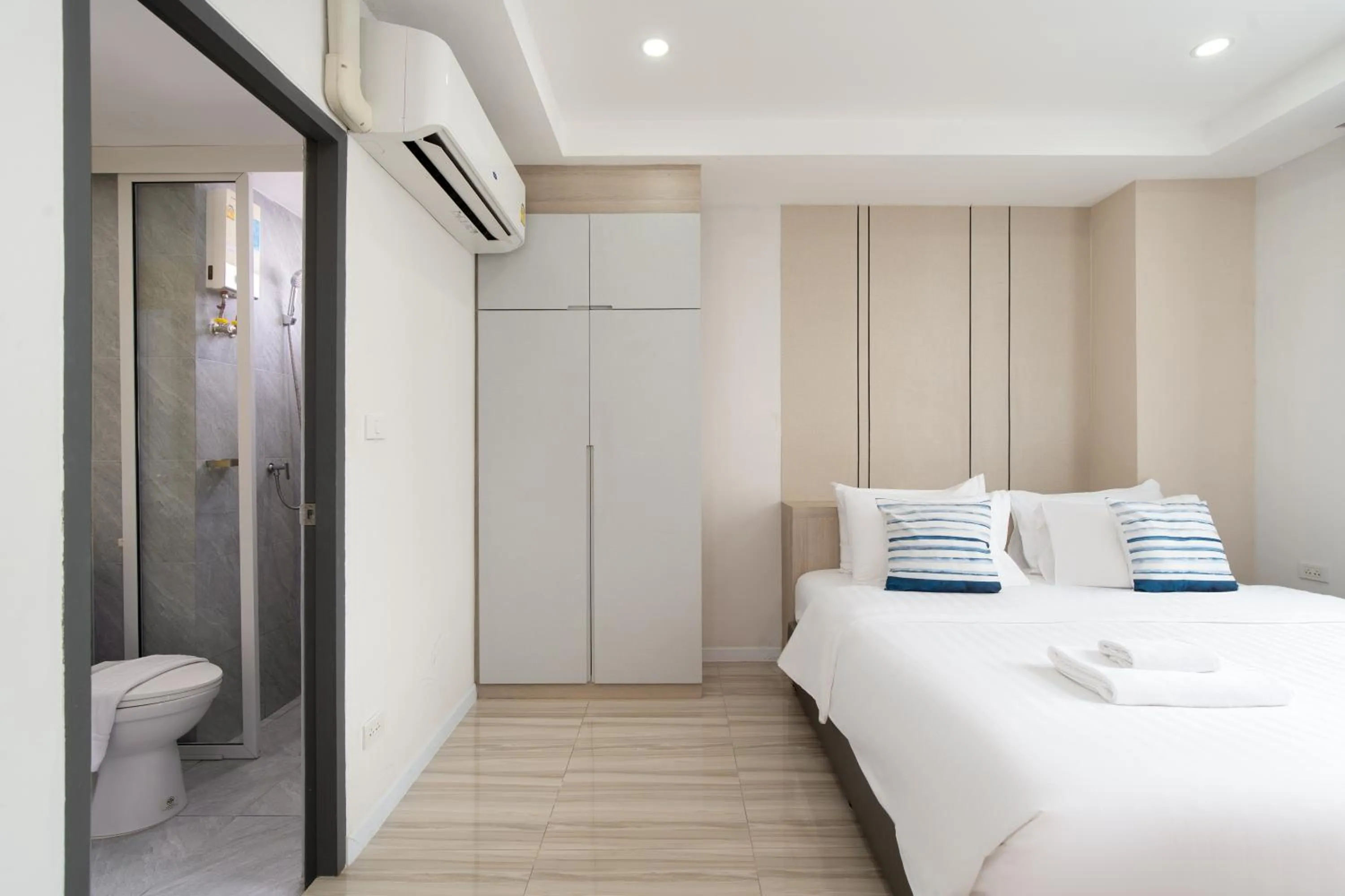 Bed in The Riski Hotel at Bangphlat Station SHA