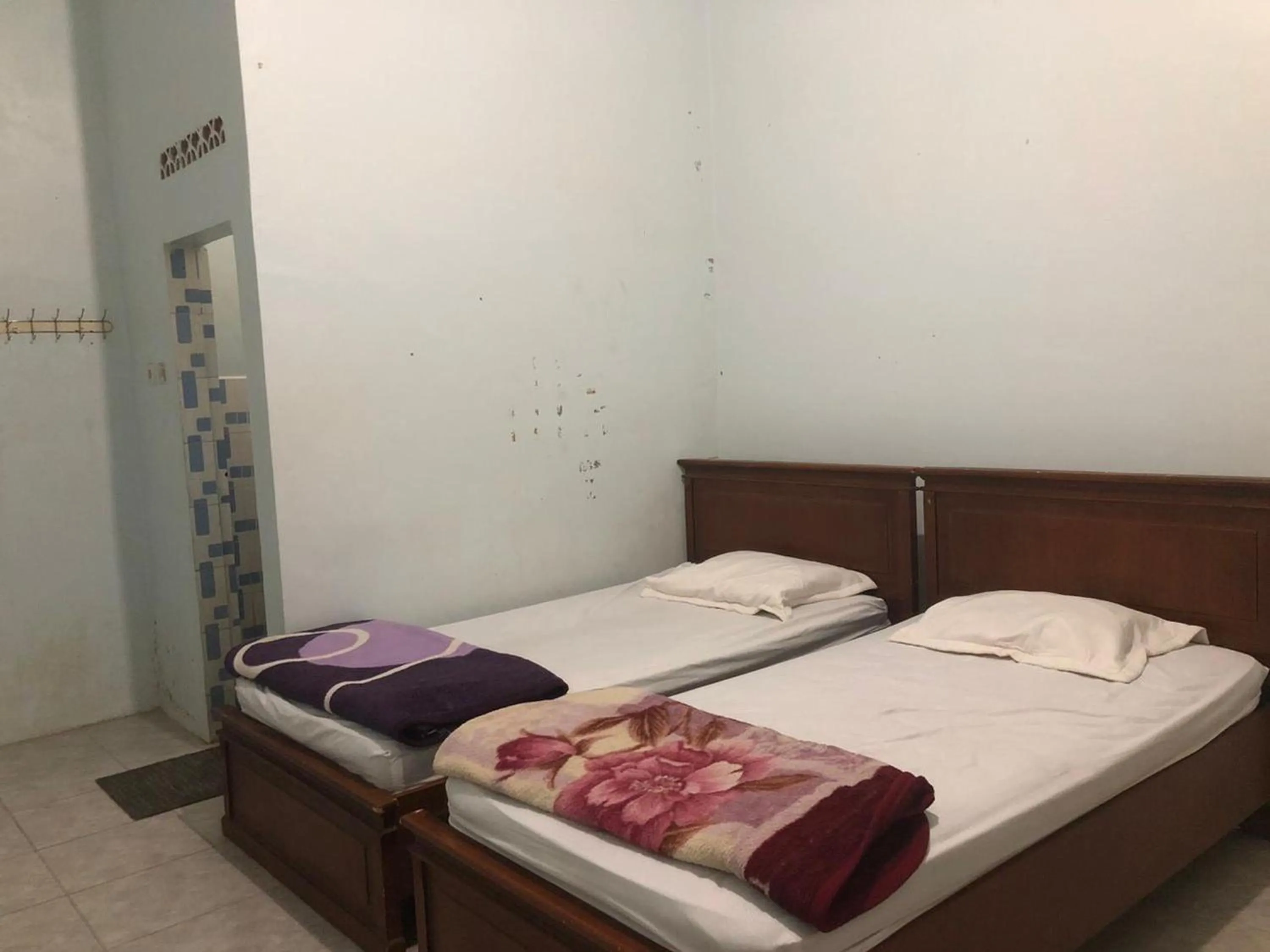 Bedroom, Bed in Friendjoss Homestay Laugumba RedPartner