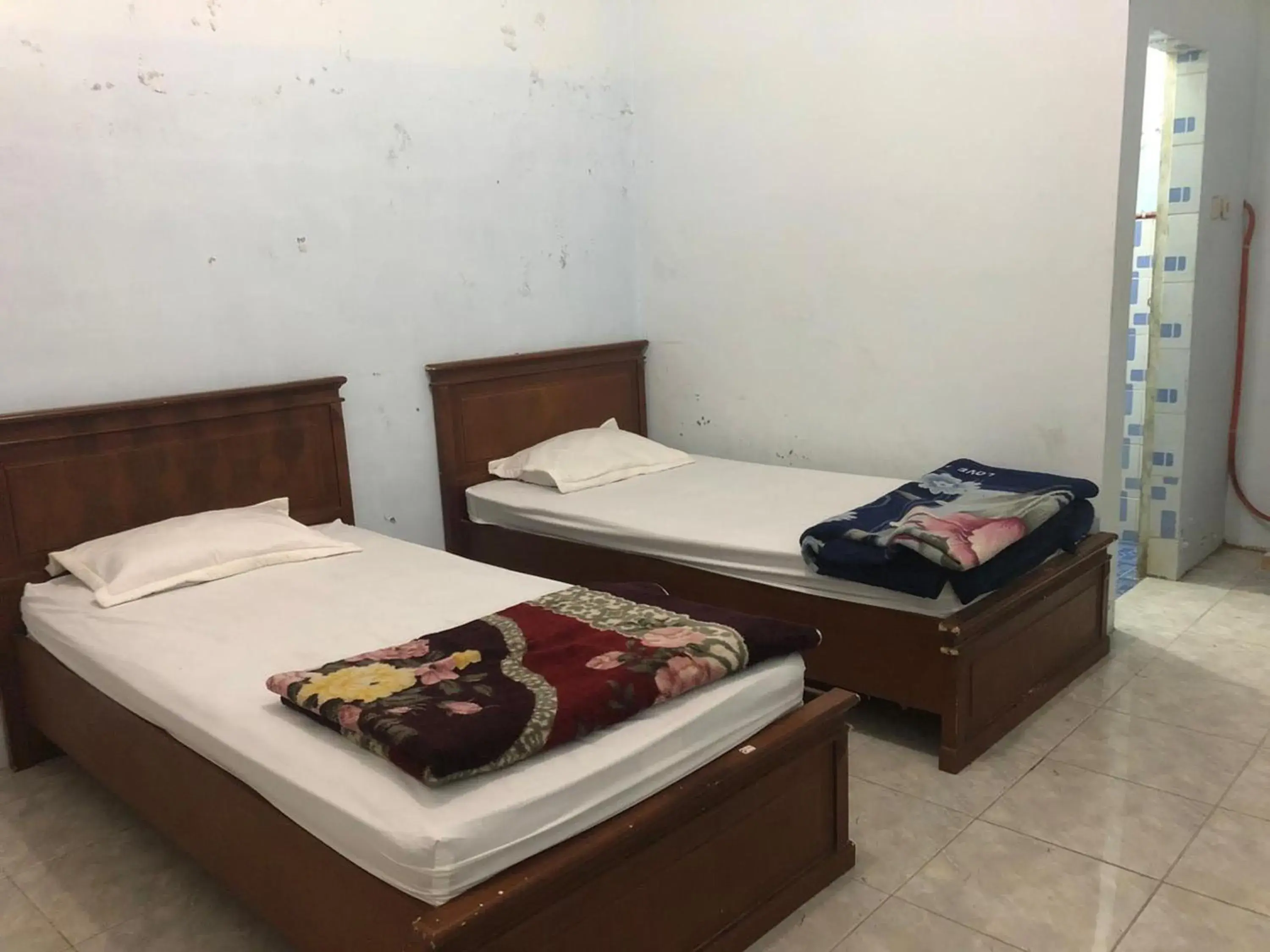 Twin Room in Friendjoss Homestay Laugumba RedPartner Twin Room in Friendjoss Homestay Laugumba RedPartner