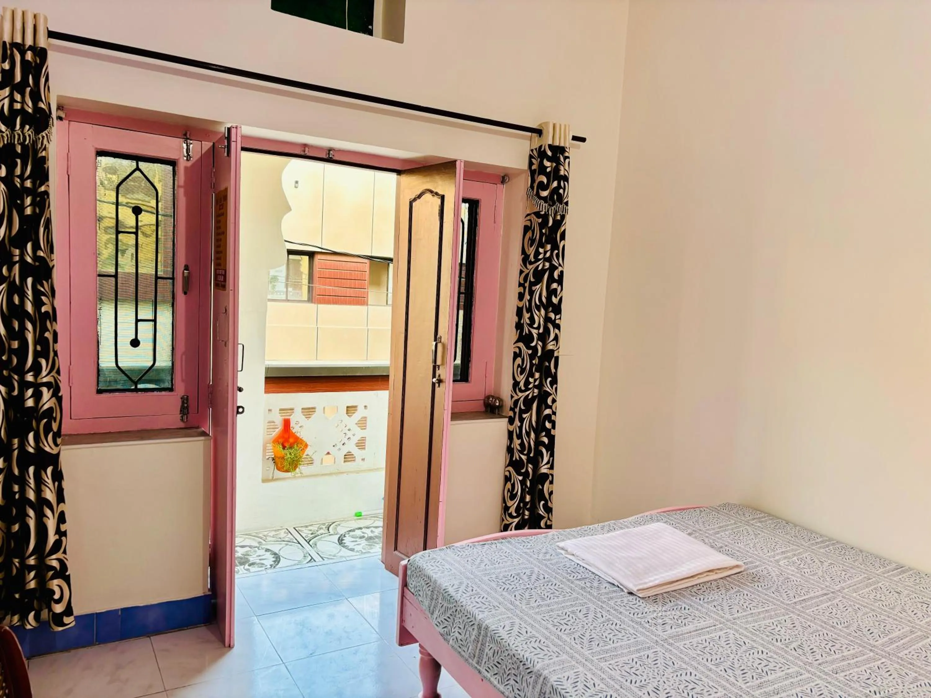 Bed in Hotel tulsi palace