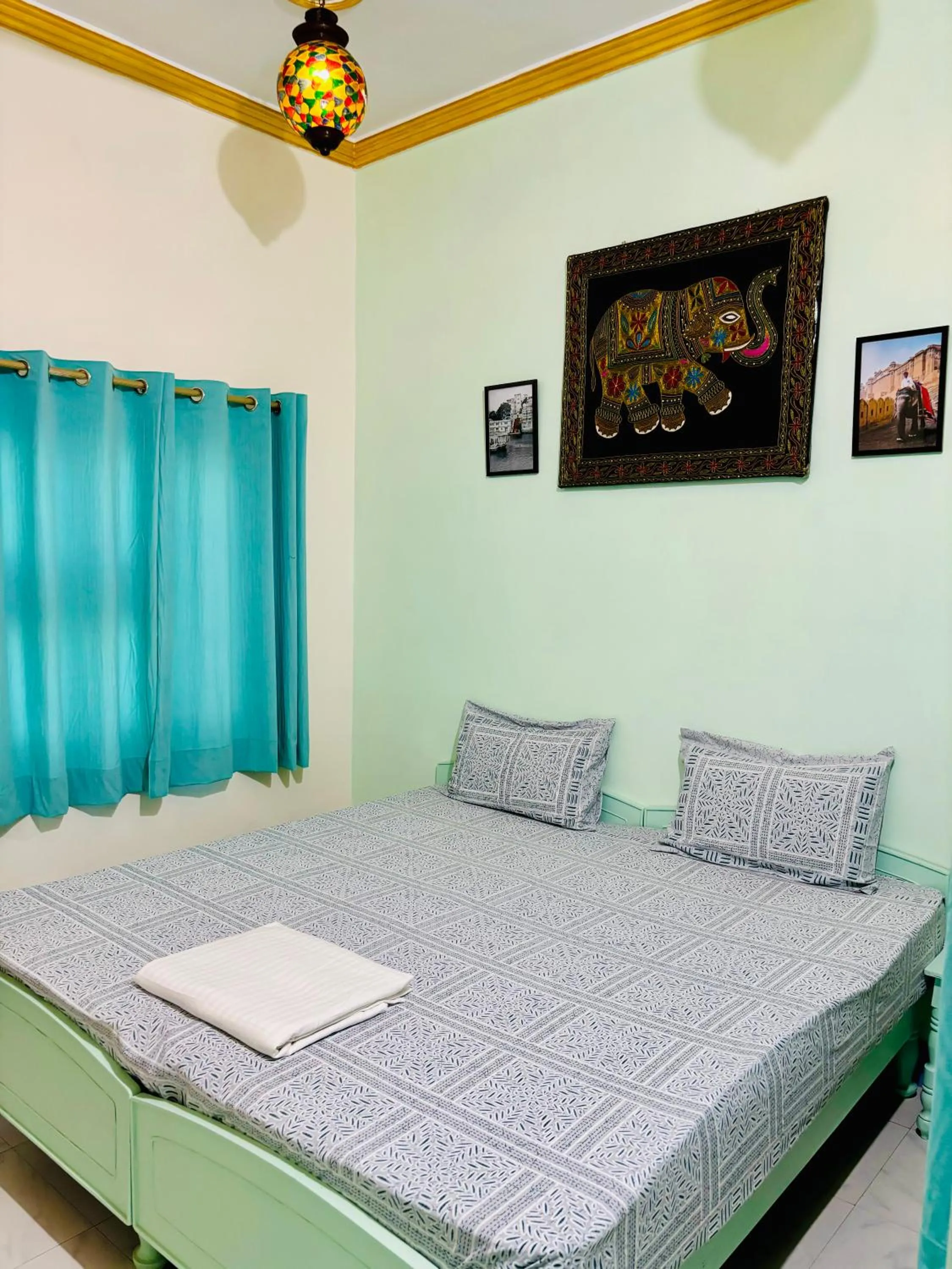 Bed in Hotel tulsi palace