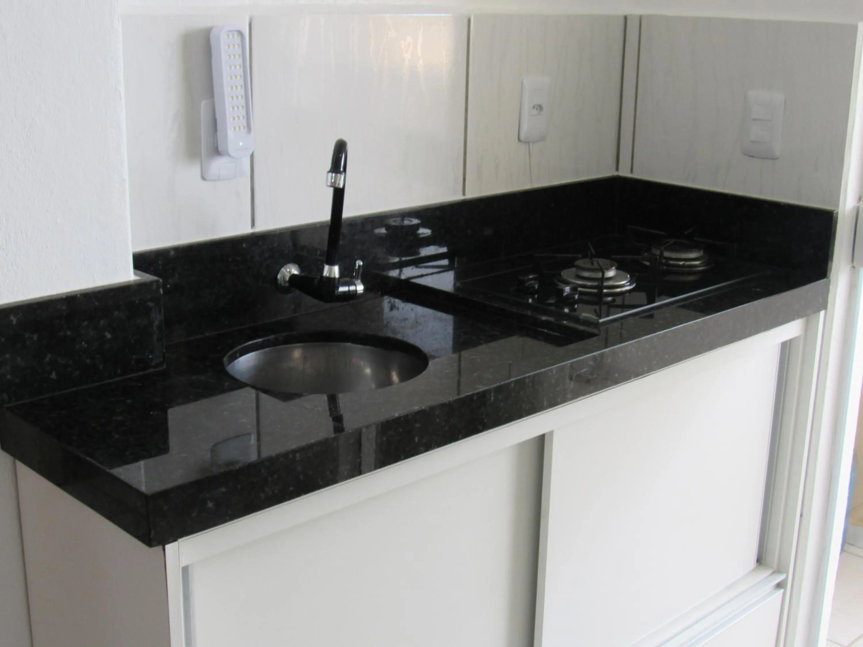 Kitchen or kitchenette in Pousada Vila do Navegante