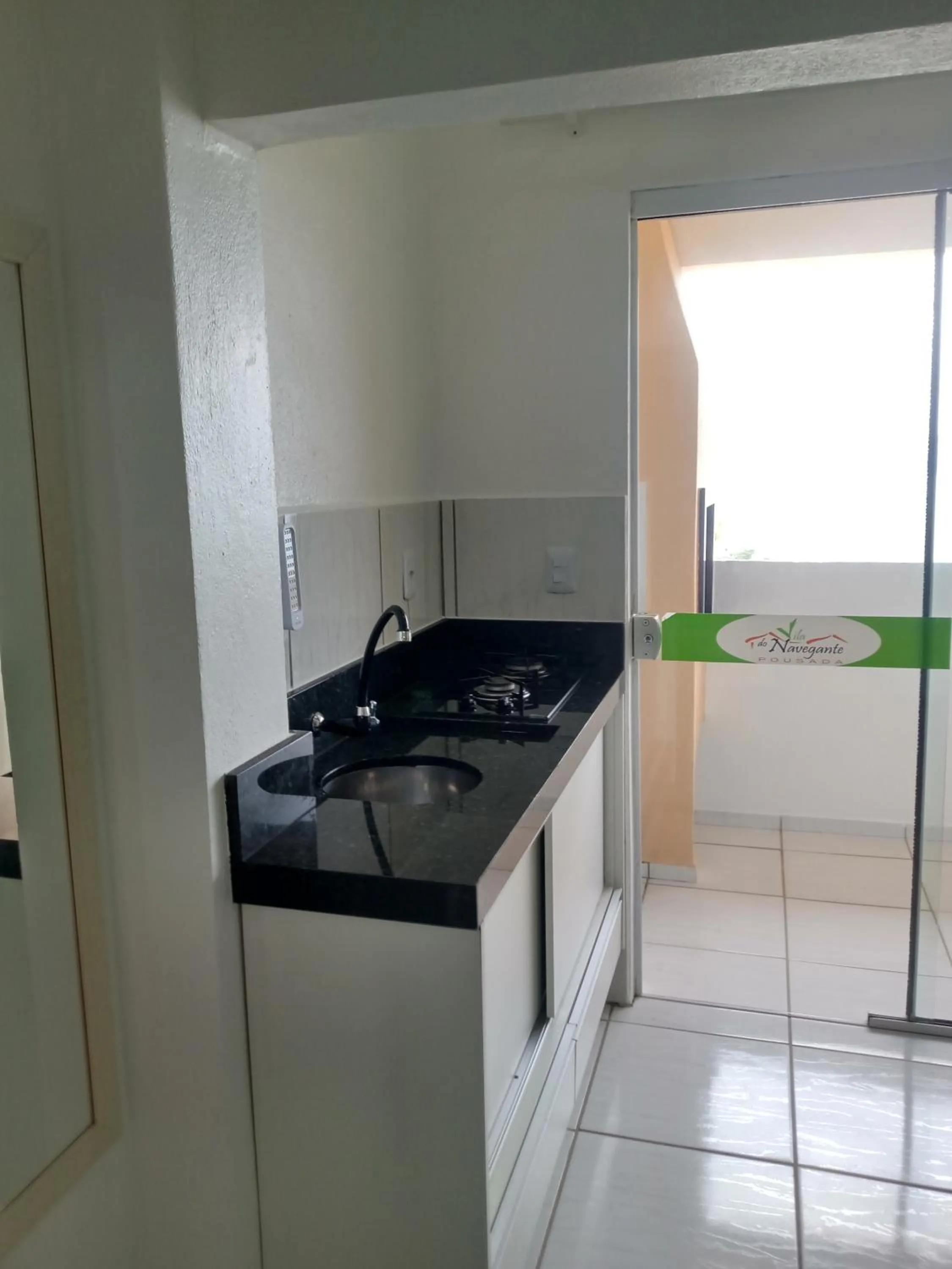 Kitchen or kitchenette in Pousada Vila do Navegante