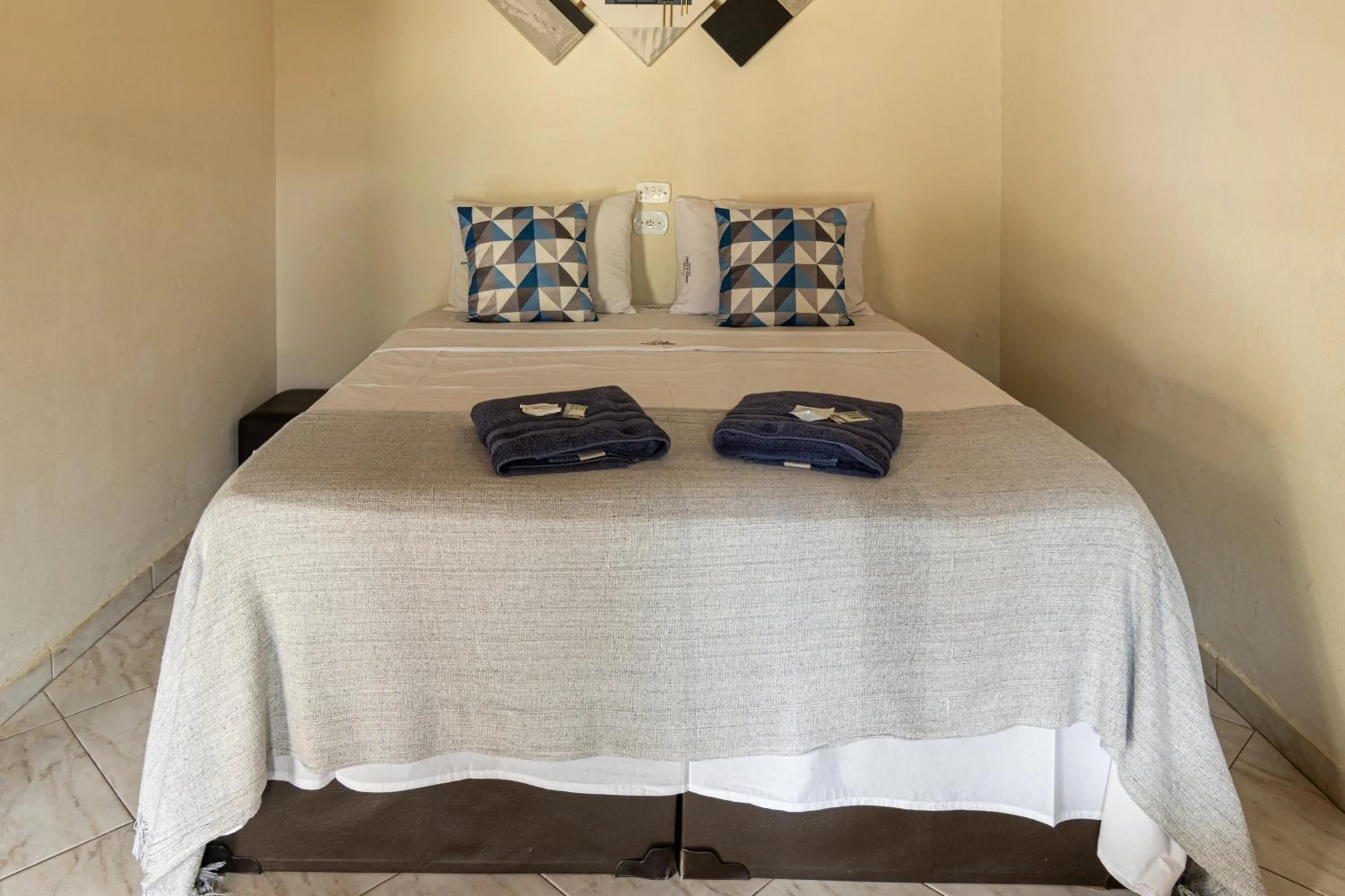 Bed in Pousada Encantos de Socorro