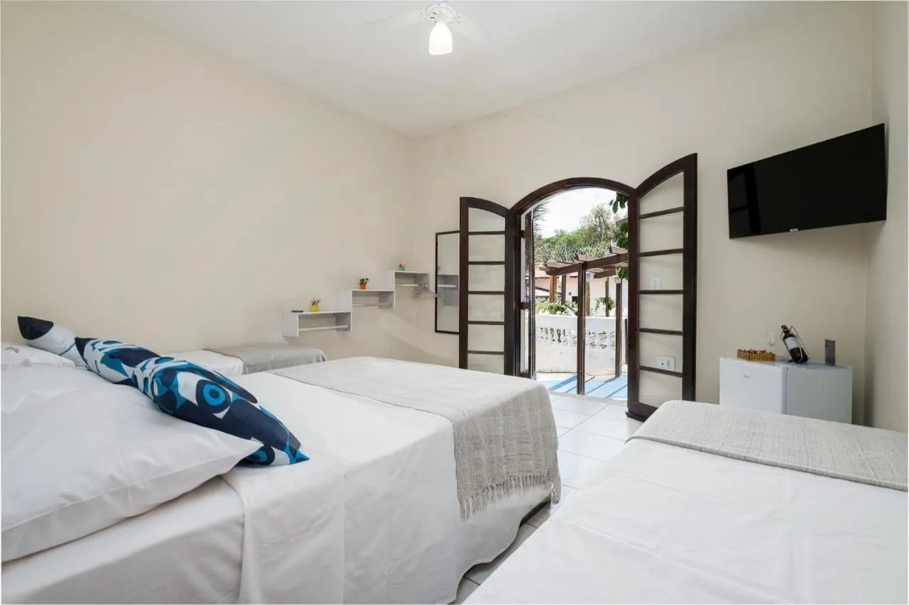 Bed in Pousada Encantos de Socorro