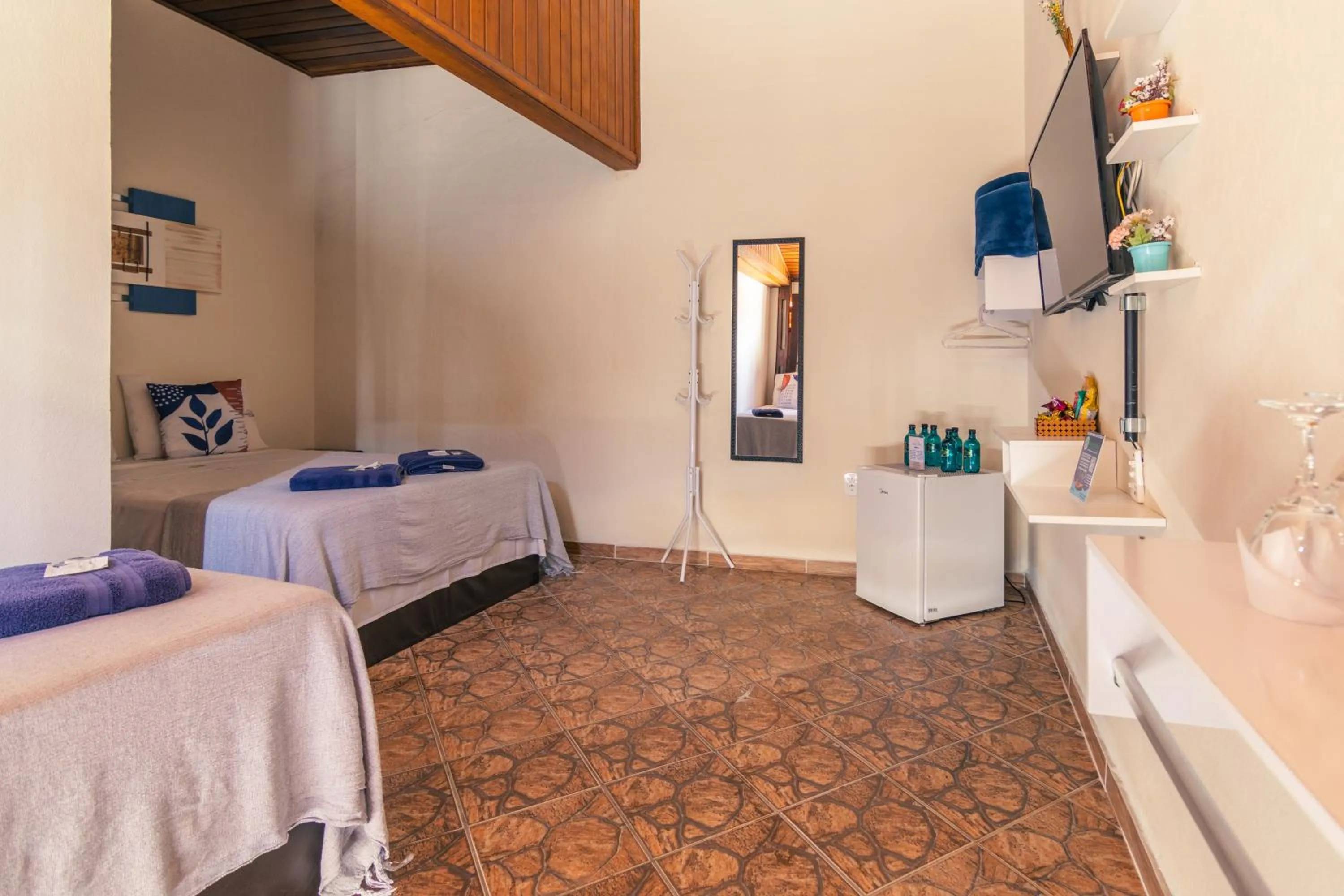 Bed in Pousada Encantos de Socorro