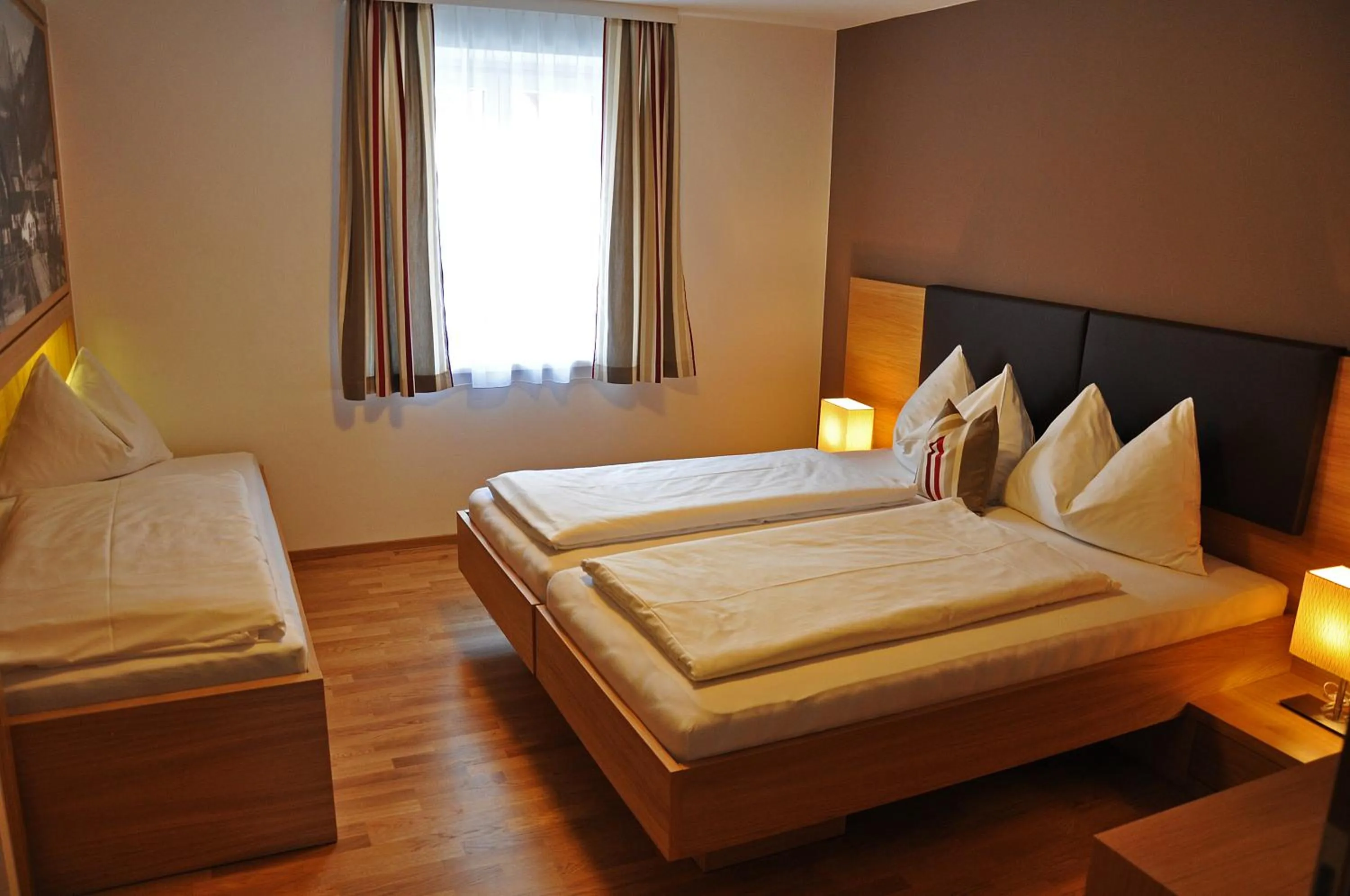 Photo of the whole room, Bed in Hotel Gasthof Tirolerwirt