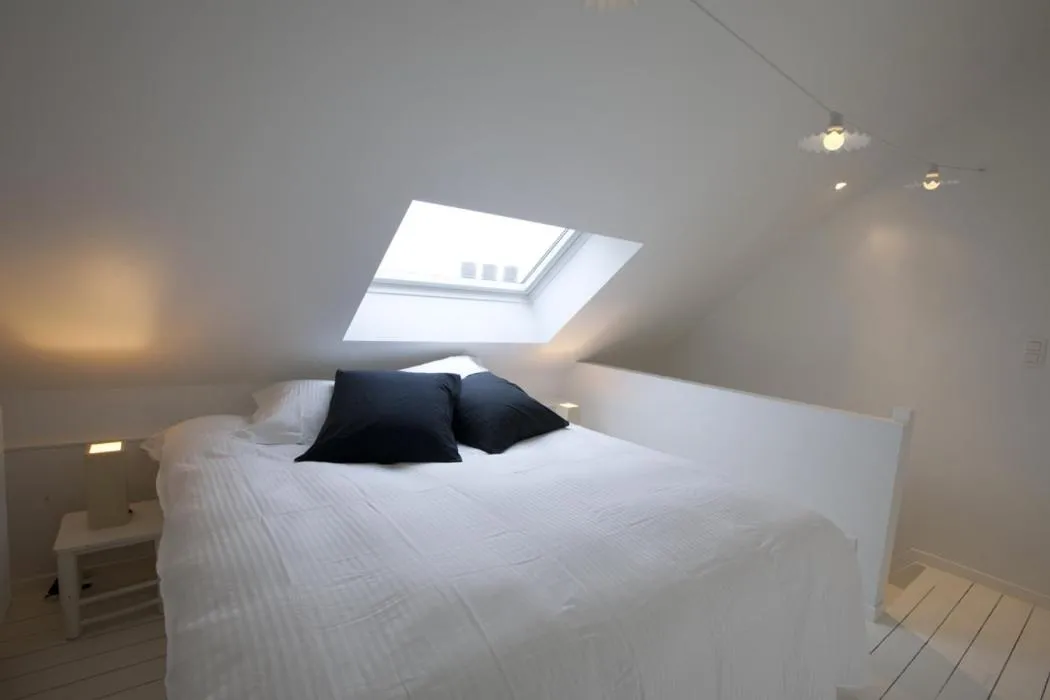 Bed in La Maison Haute guesthouse