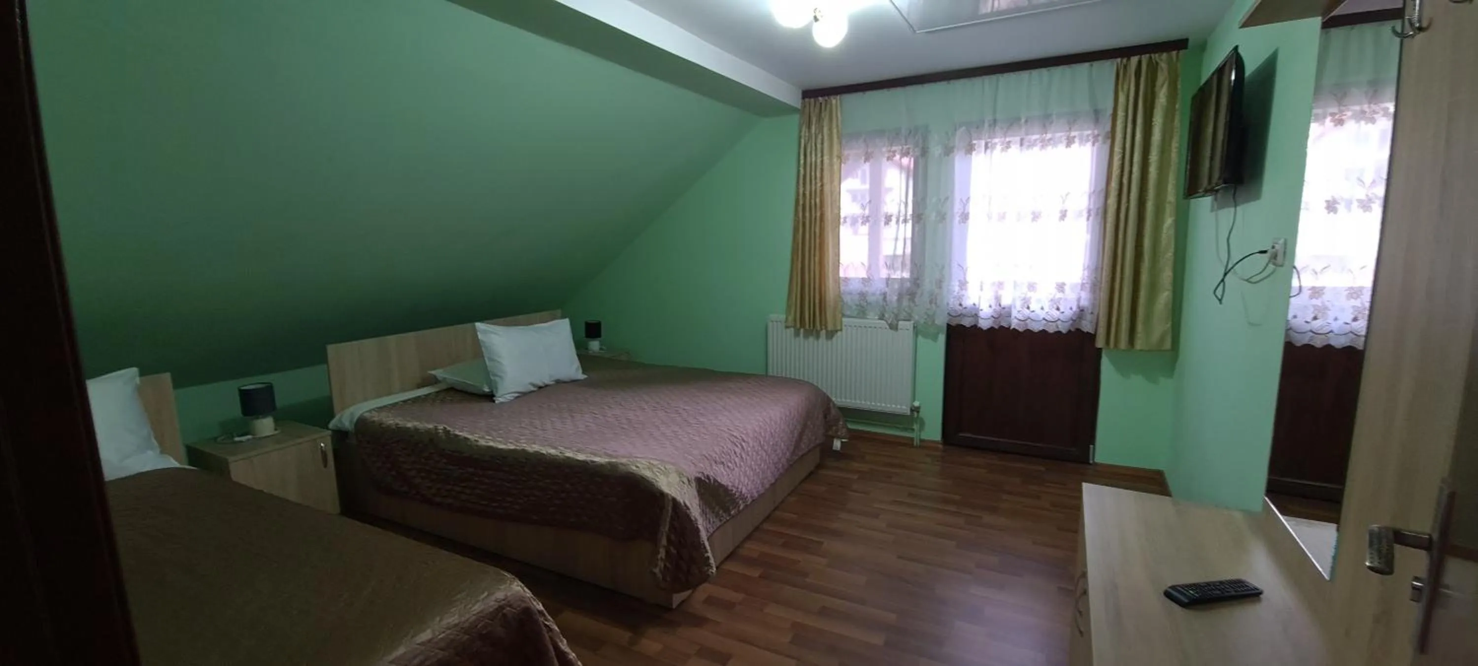 Bed in Pensiunea Aurora - Great Hostel Voineasa