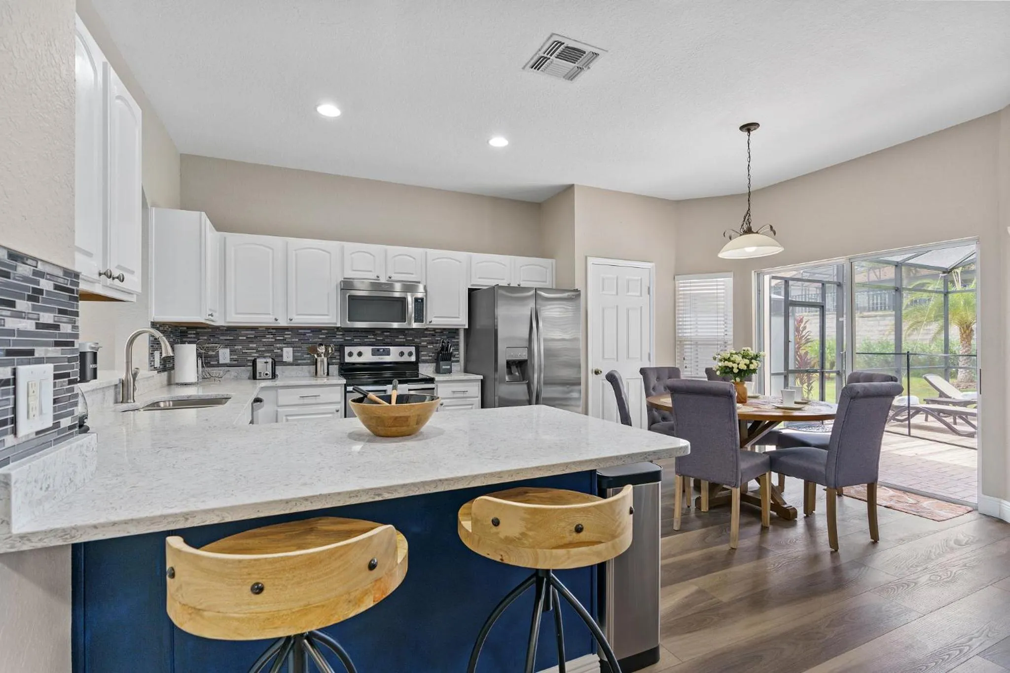 Kitchen or kitchenette in WindsorHills Villa Pool Resort Amenities Minutes to Disney