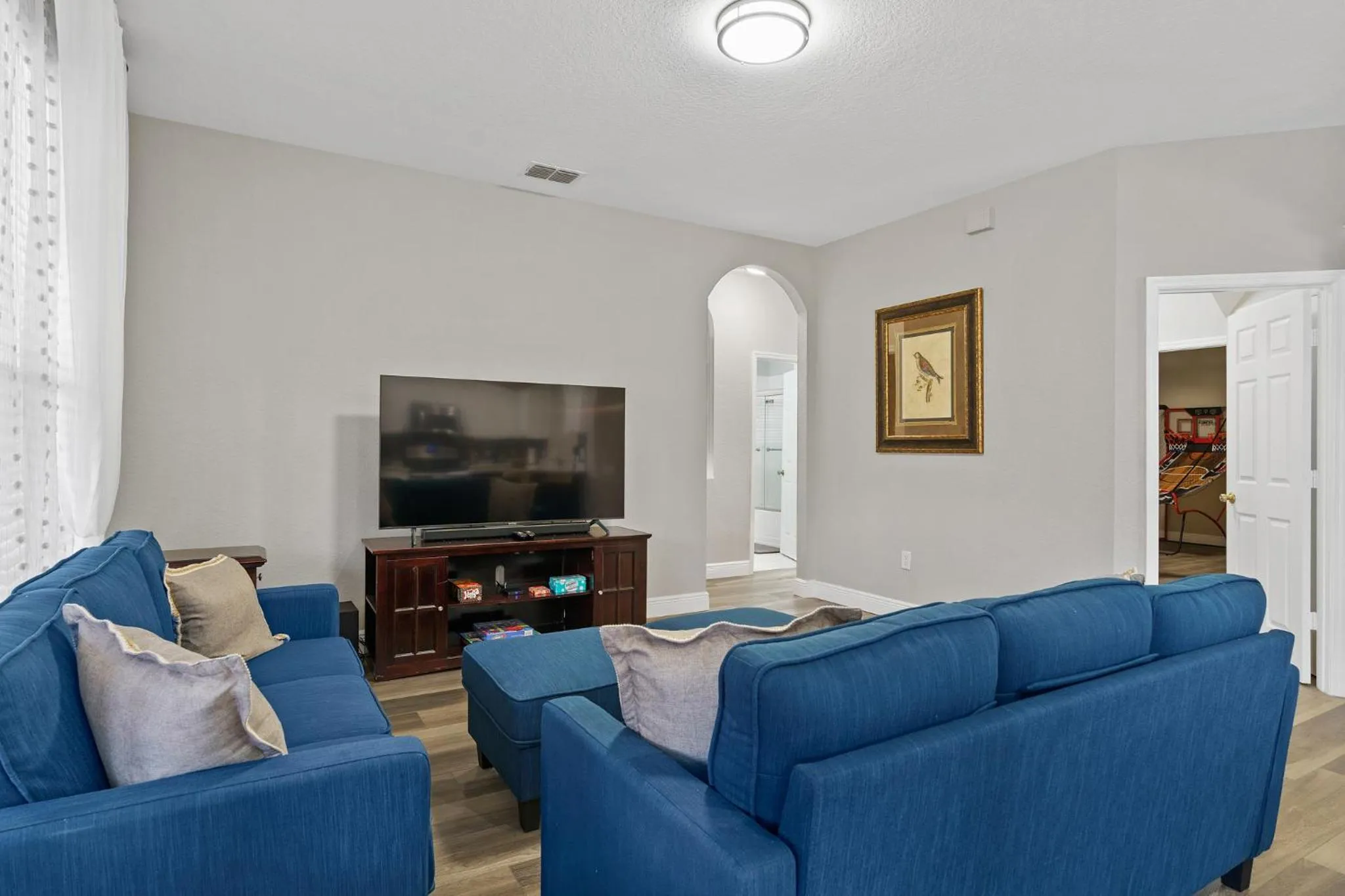 Living room in WindsorHills Villa Pool Resort Amenities Minutes to Disney