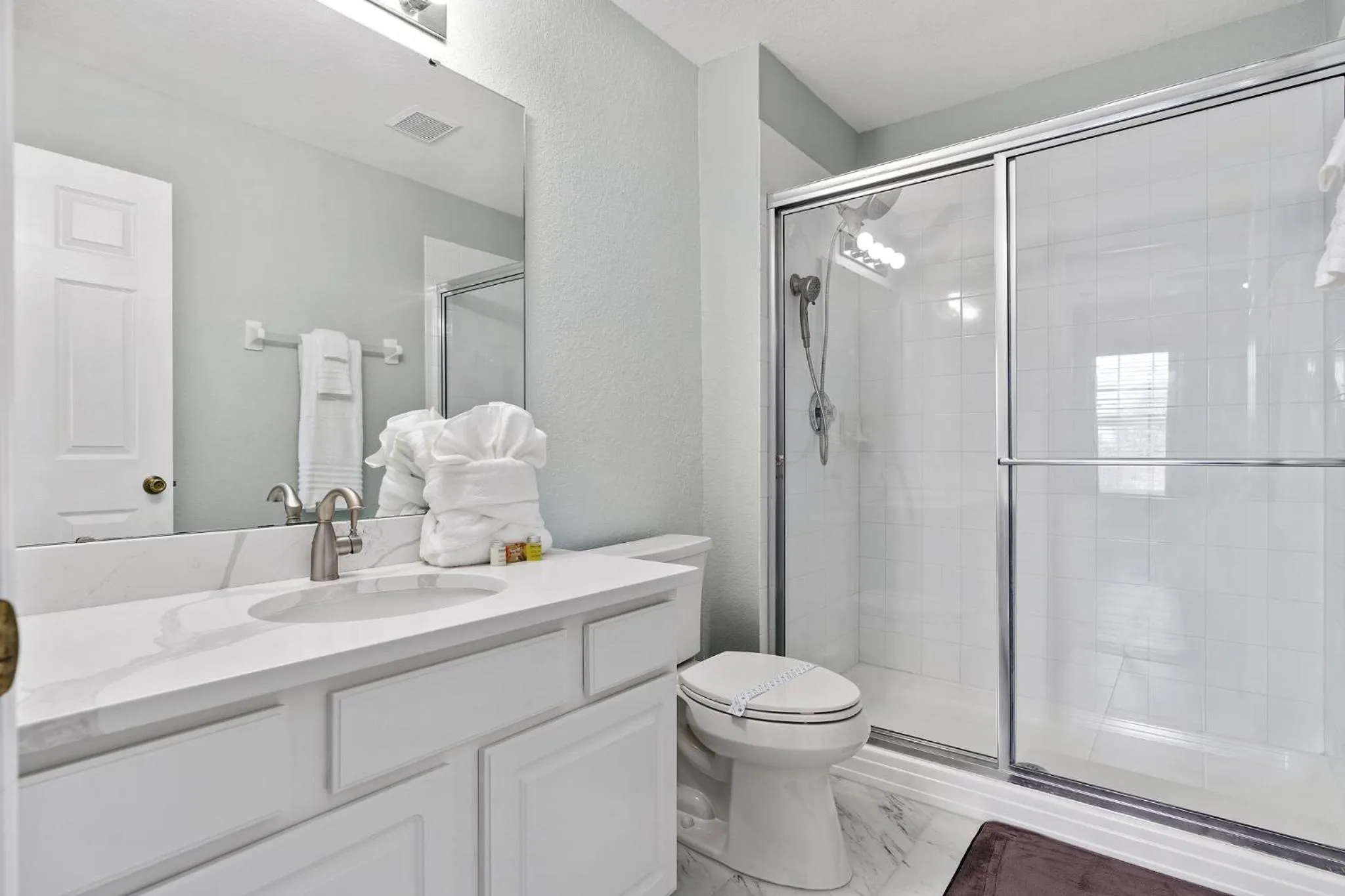 Bathroom in WindsorHills Villa Pool Resort Amenities Minutes to Disney