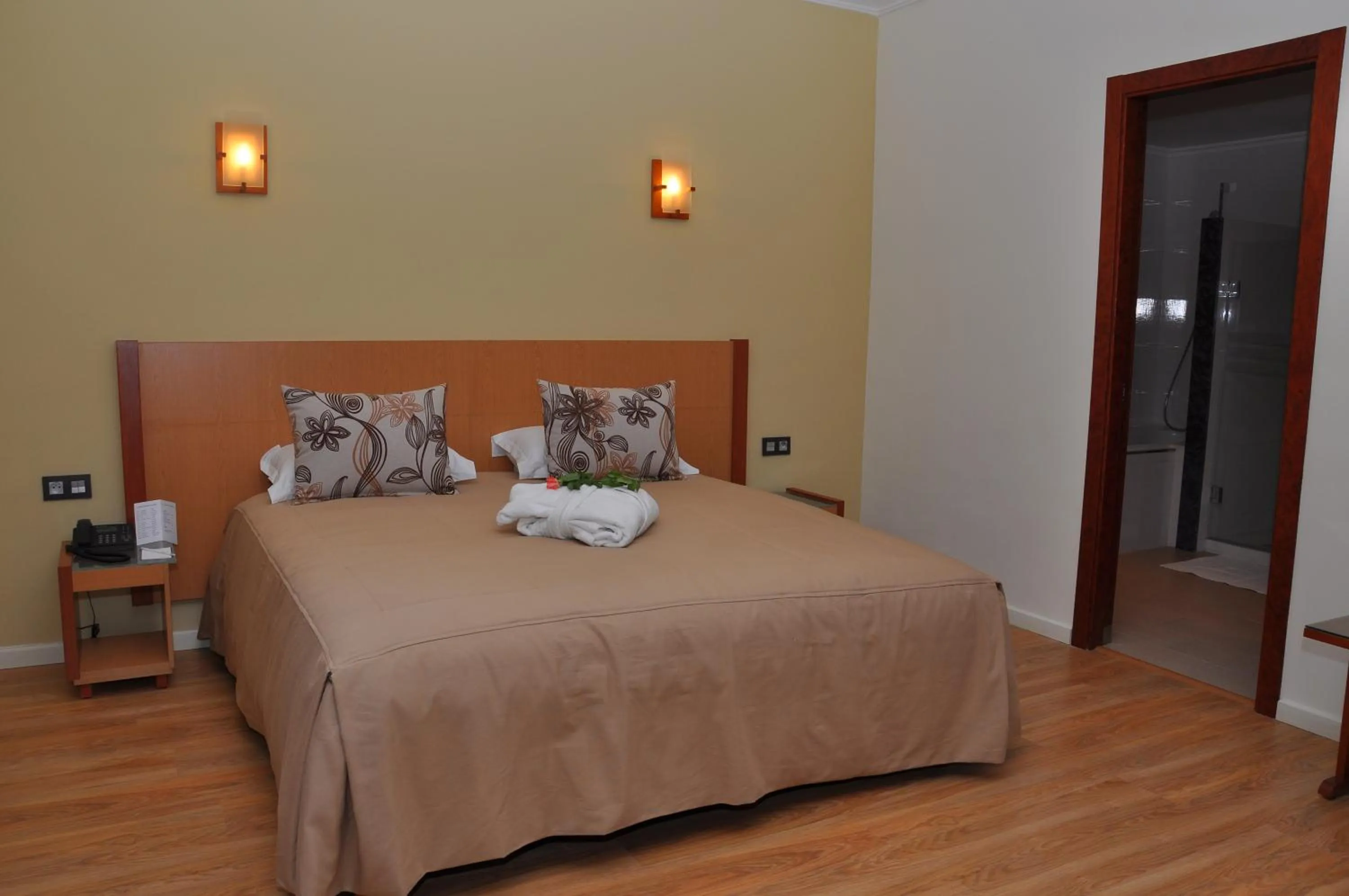 Bedroom, Bed in Across Hotels & Spa