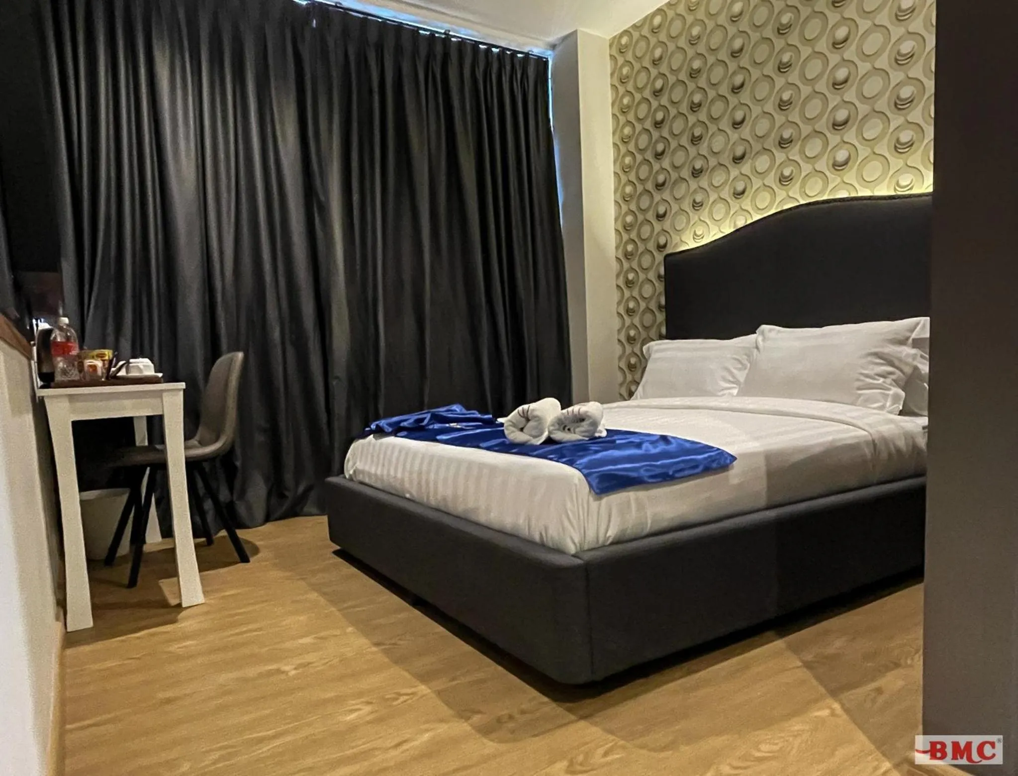 Photo of the whole room, Bed in BMC Hotel