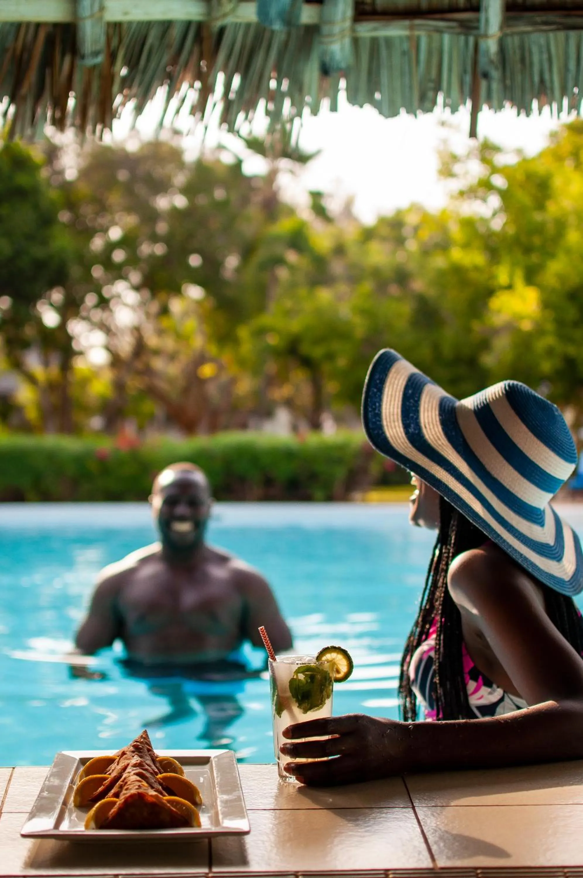 People in Diamonds Leisure Beach & Golf Resort