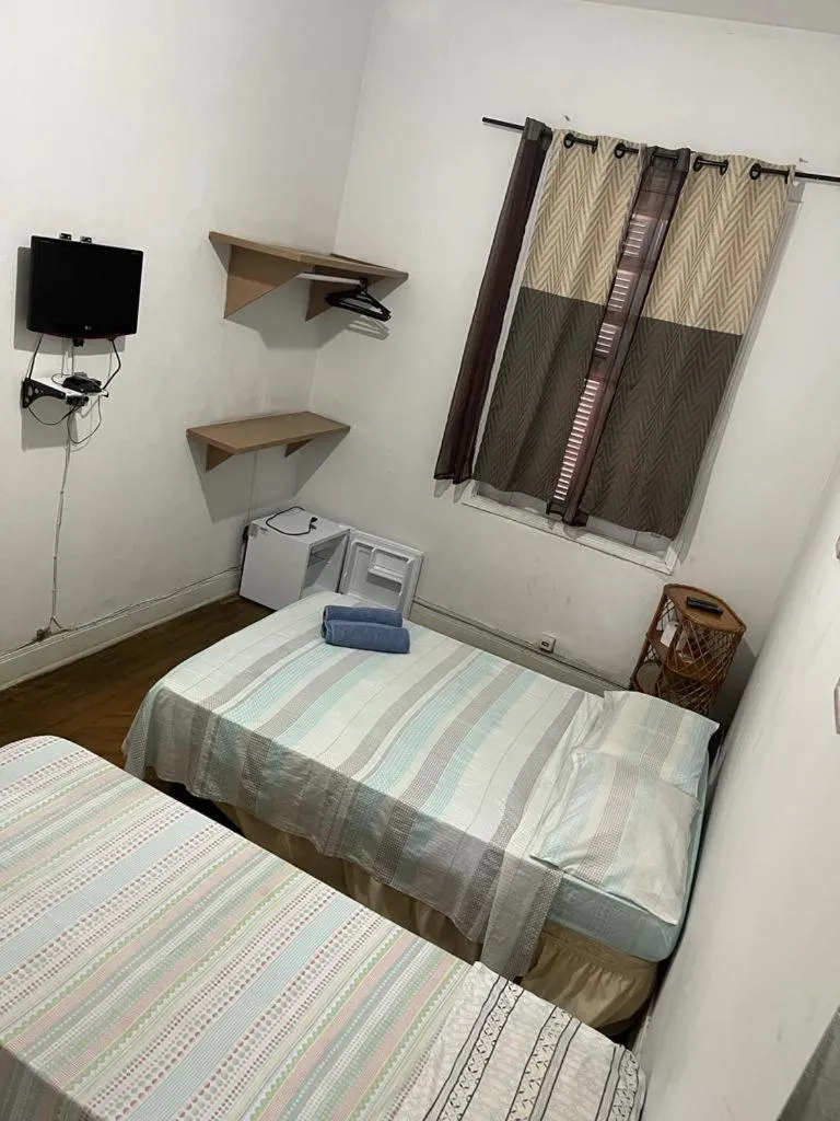 Bed in Pousada Vila Pitanga