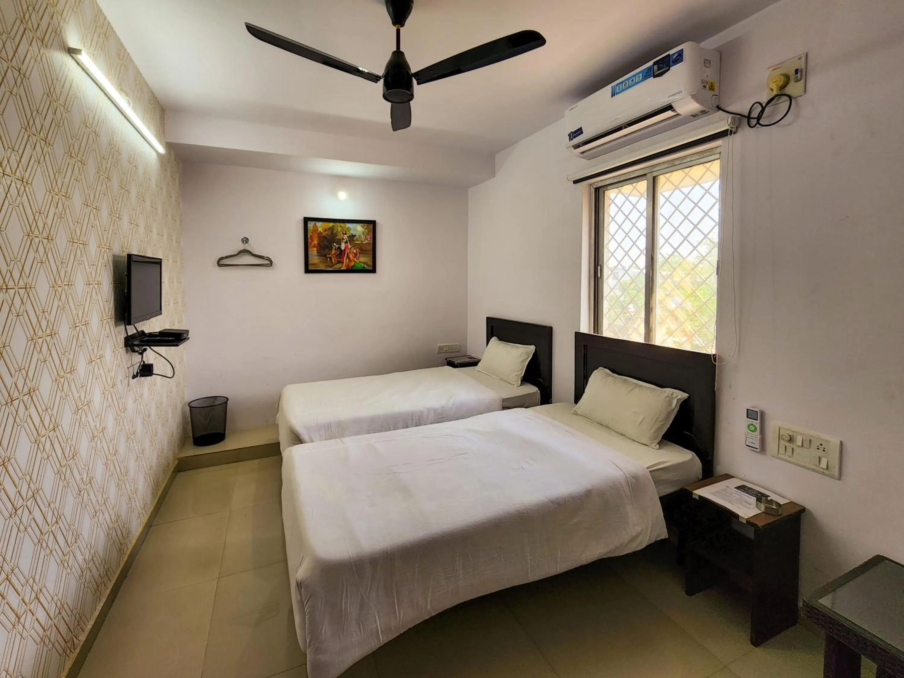 Bed in Shivani Inn Hotel & Banquet