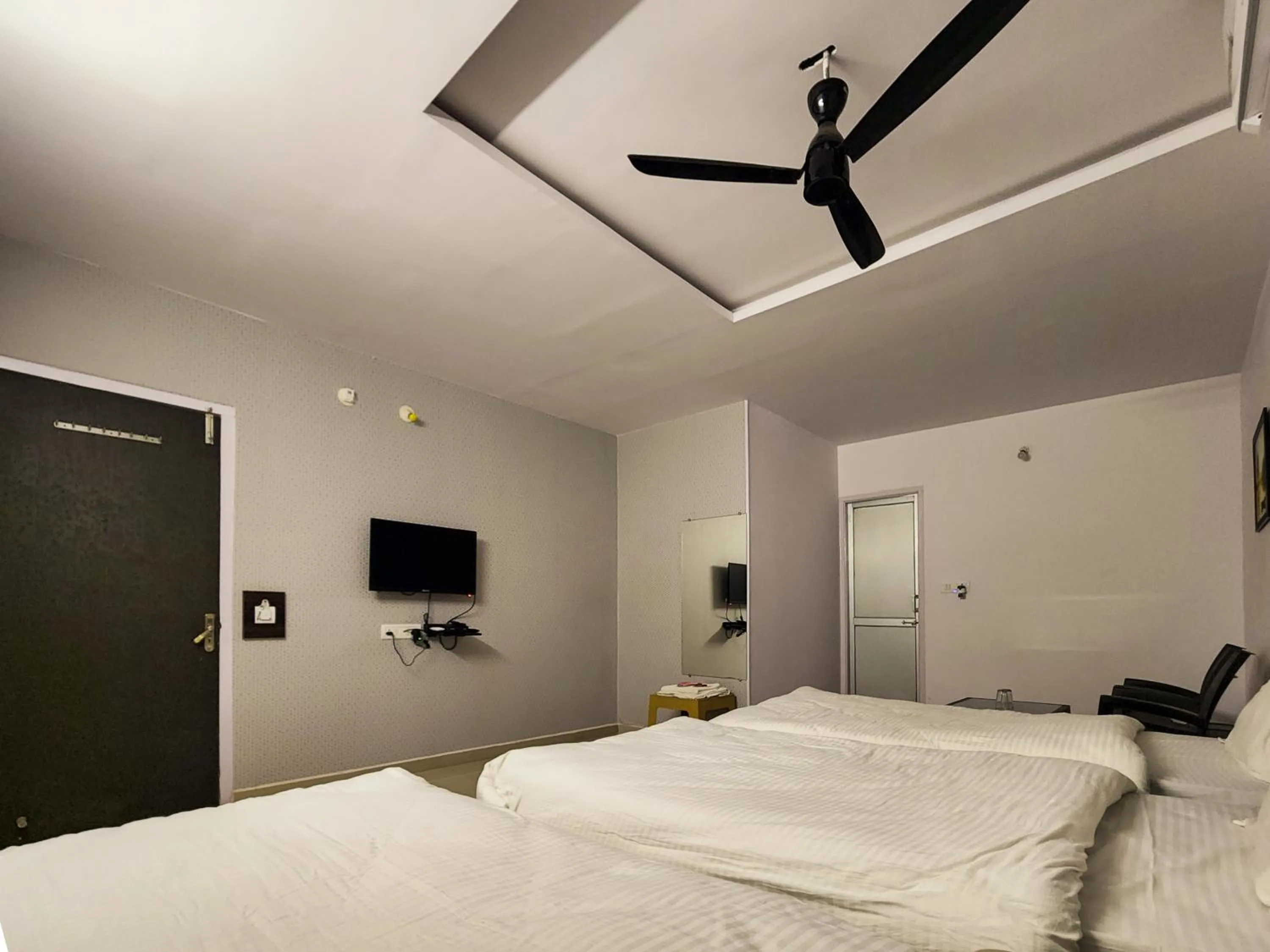 Bed in Shivani Inn Hotel & Banquet