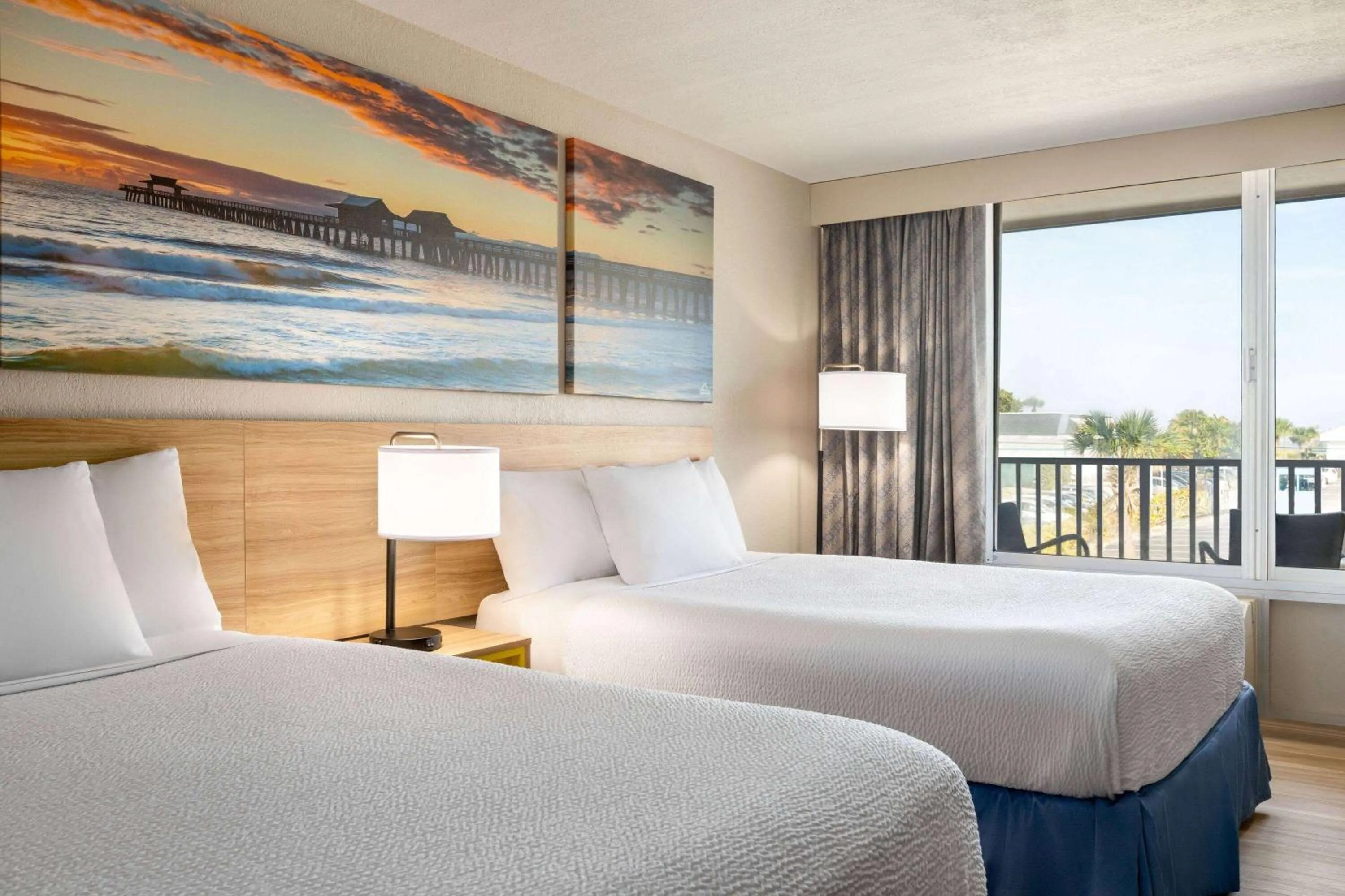 Bed in Days Inn by Wyndham Cocoa Beach Port Canaveral