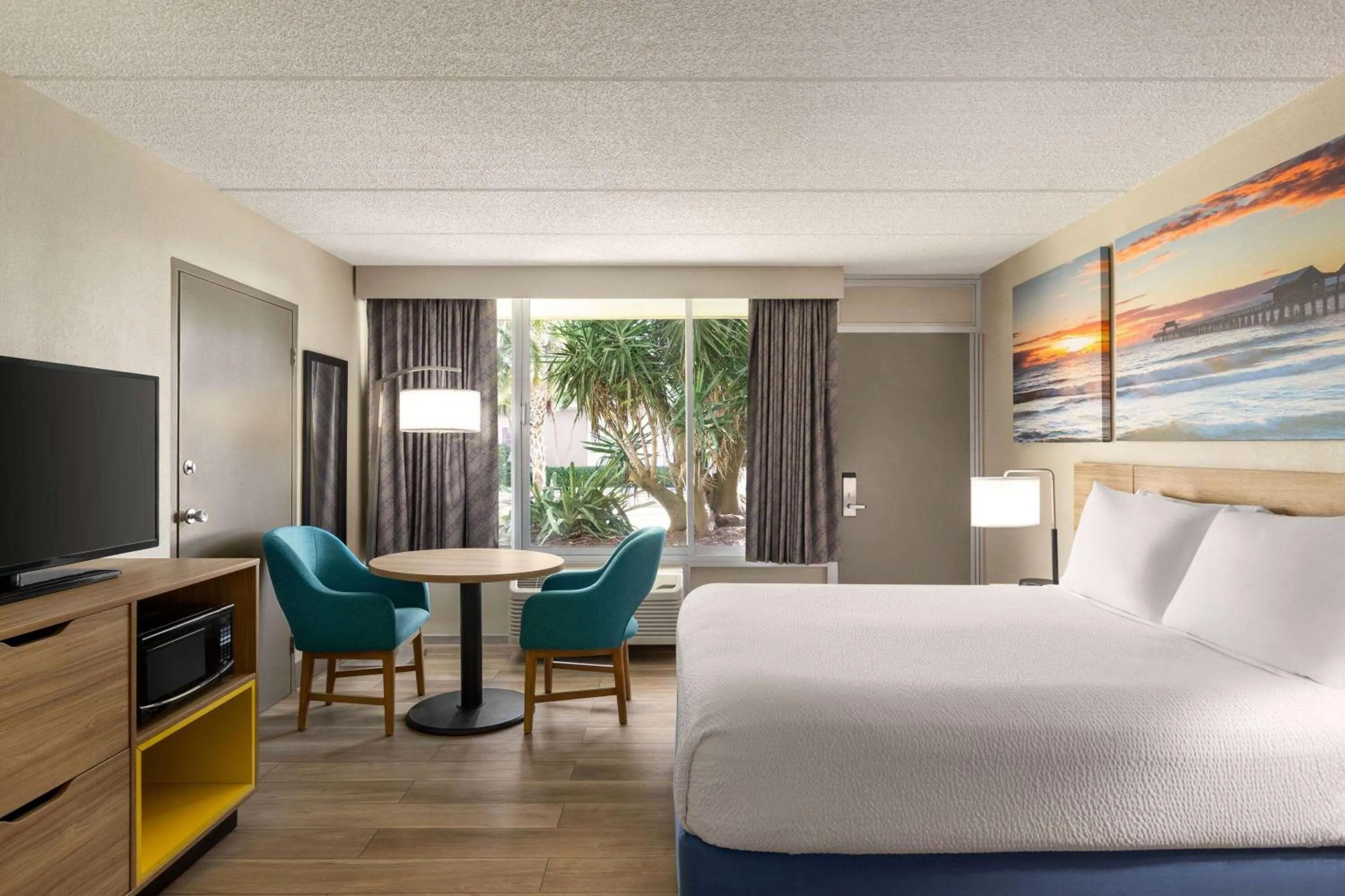 Photo of the whole room, Bed in Days Inn by Wyndham Cocoa Beach Port Canaveral