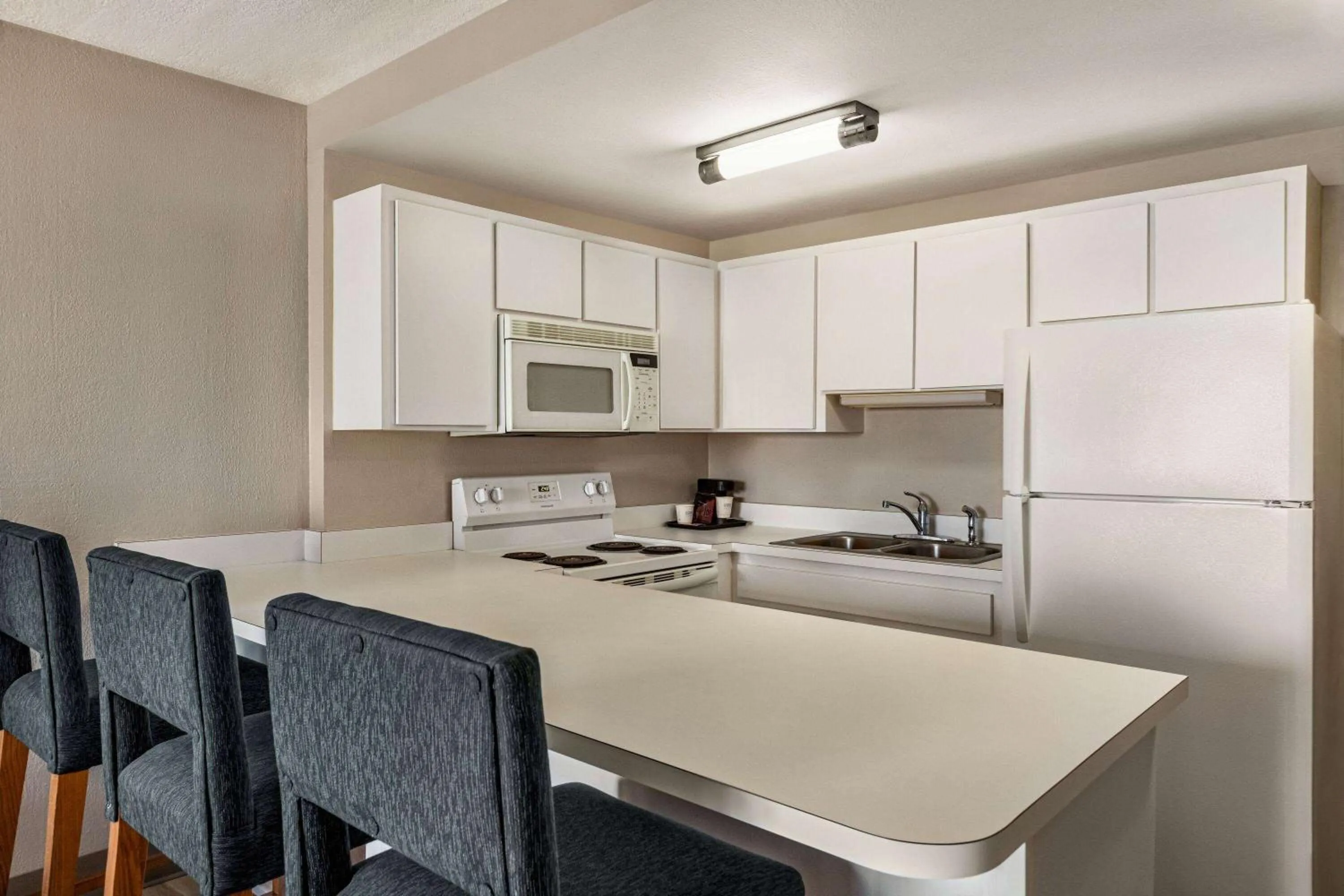 Bed in Days Inn by Wyndham Cocoa Beach Port Canaveral