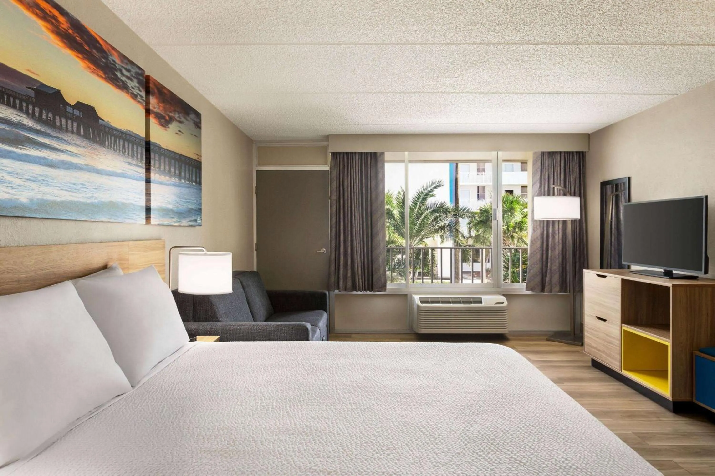 Photo of the whole room, Bed in Days Inn by Wyndham Cocoa Beach Port Canaveral