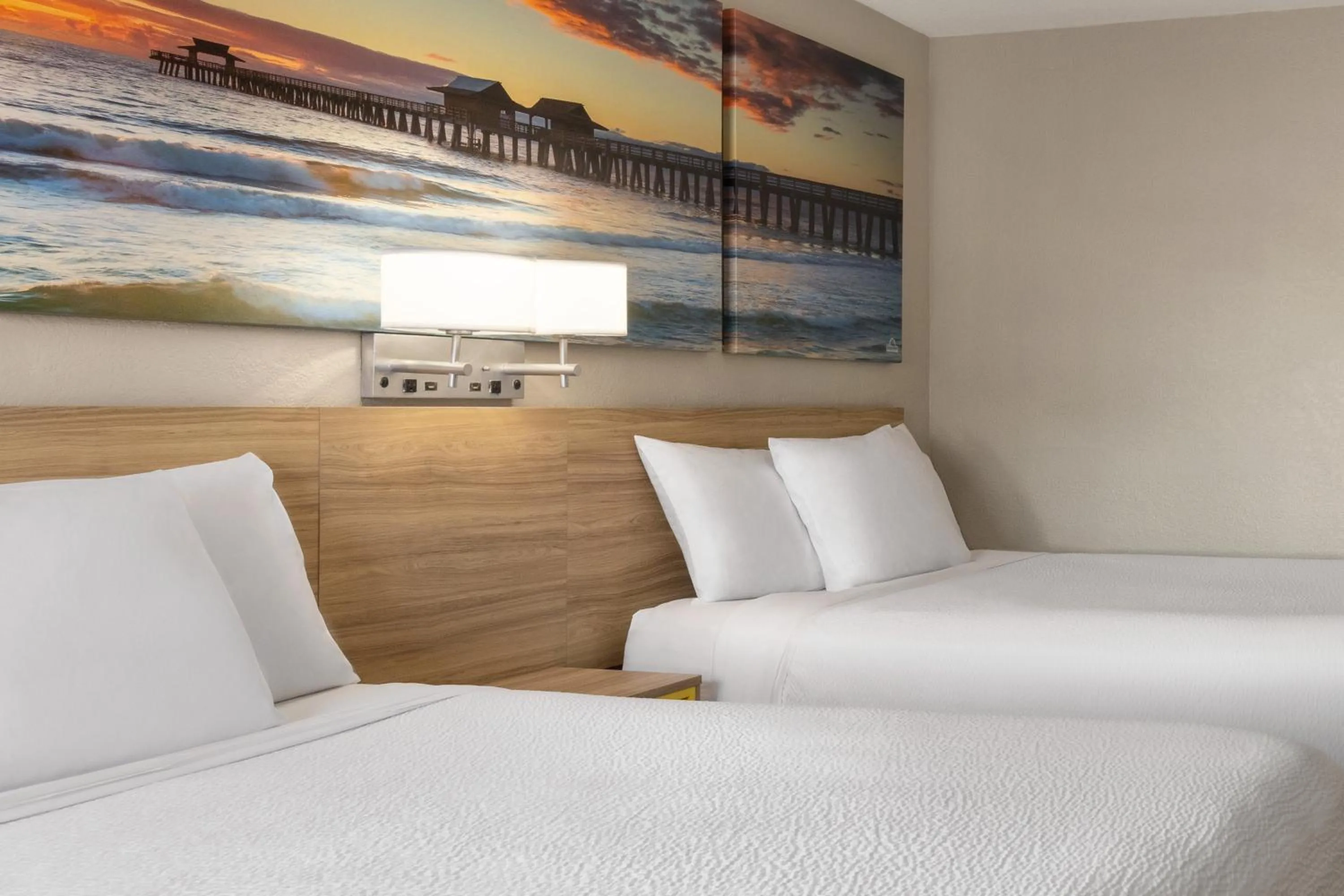 Bed in Days Inn by Wyndham Cocoa Beach Port Canaveral