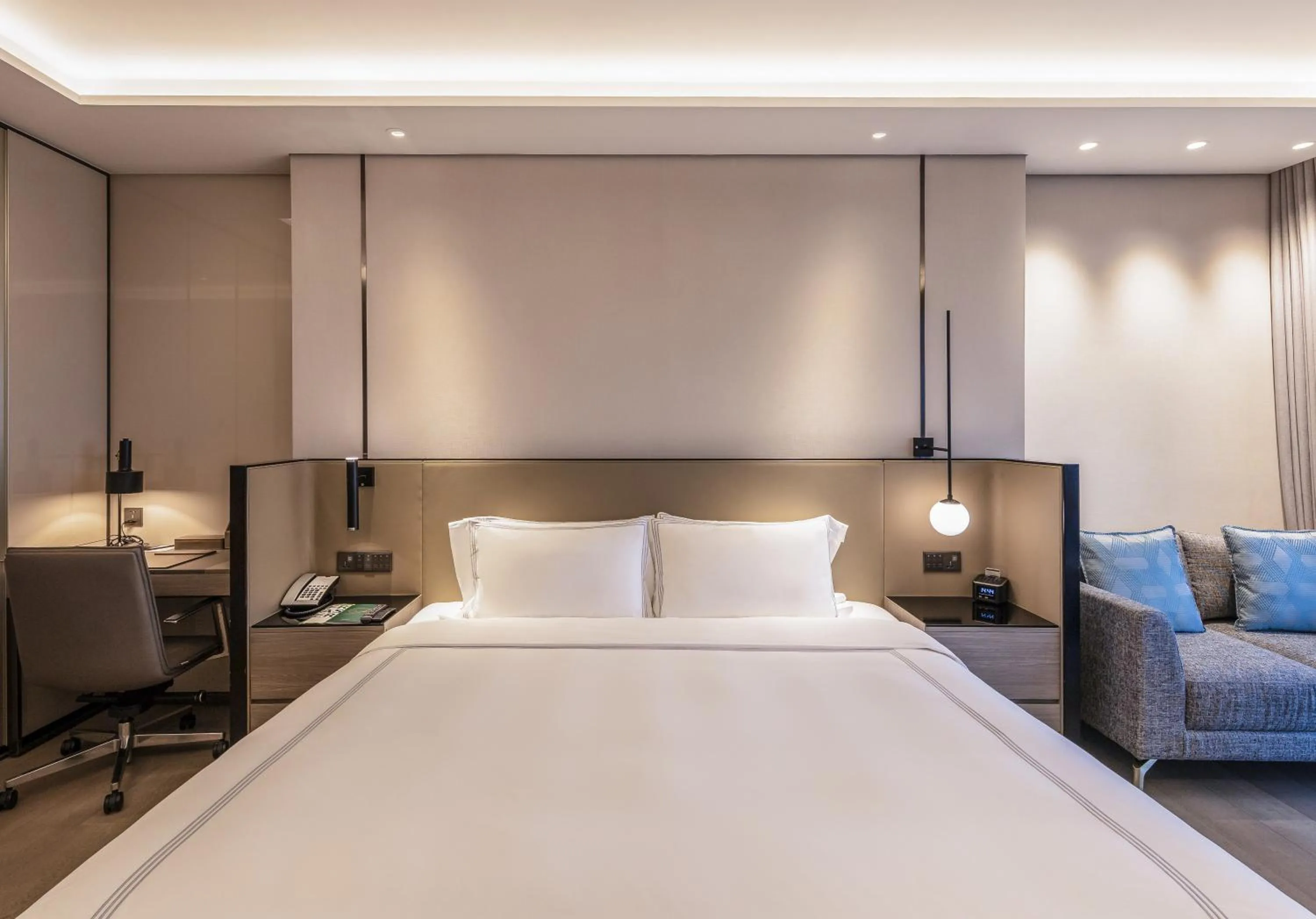 Bed in Fraser Residence Hanoi