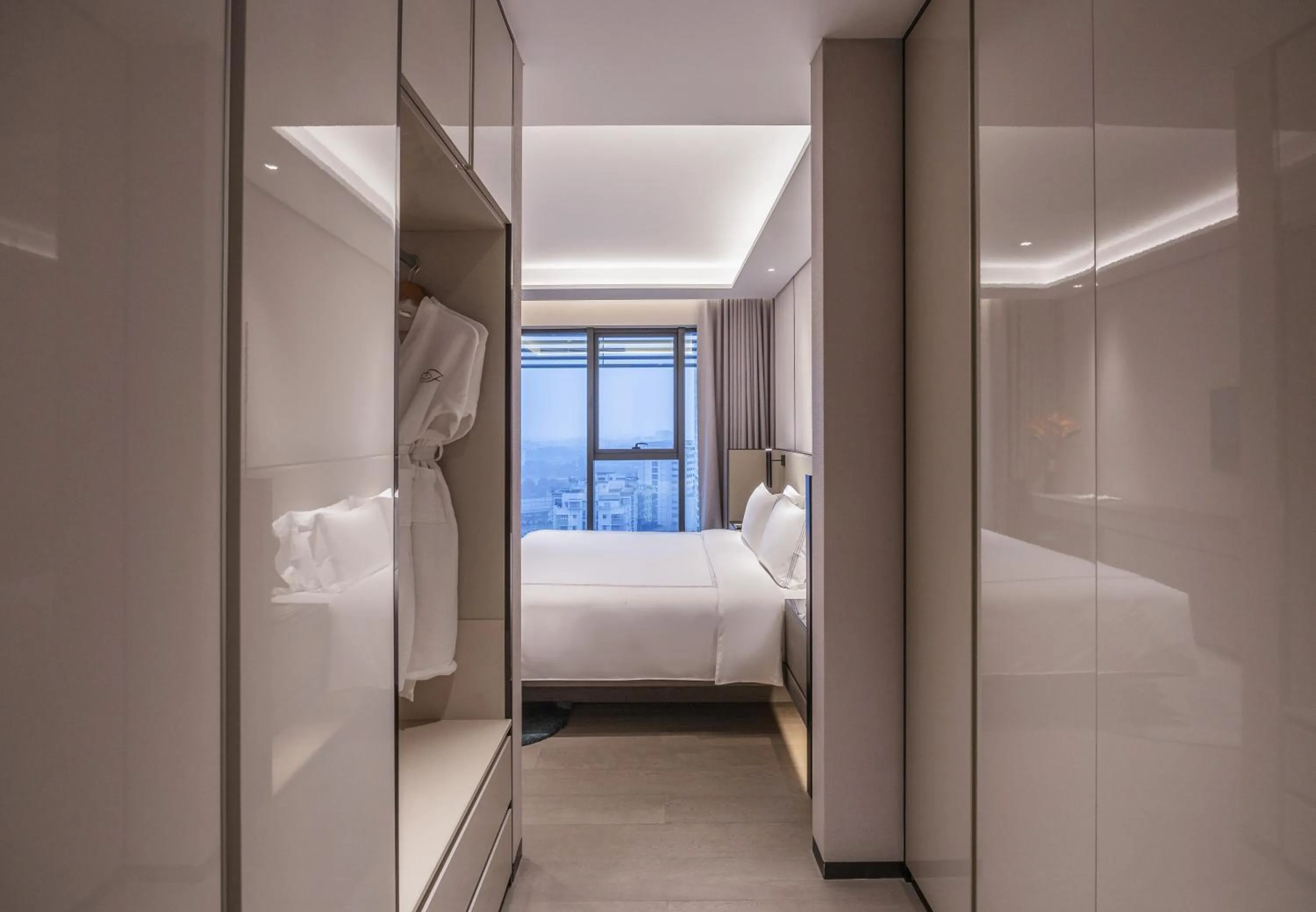 Bed in Fraser Residence Hanoi