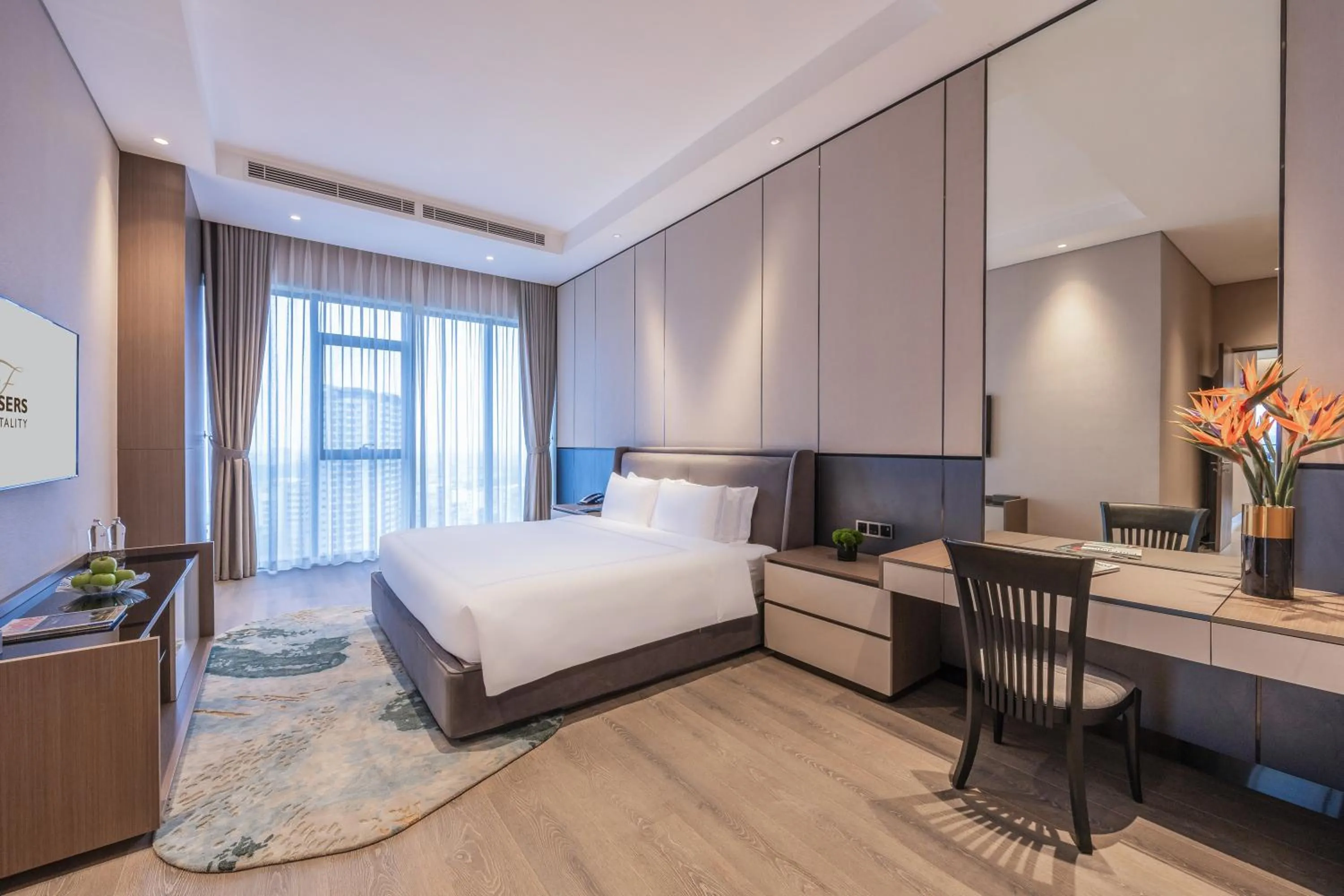 Bed in Fraser Residence Hanoi